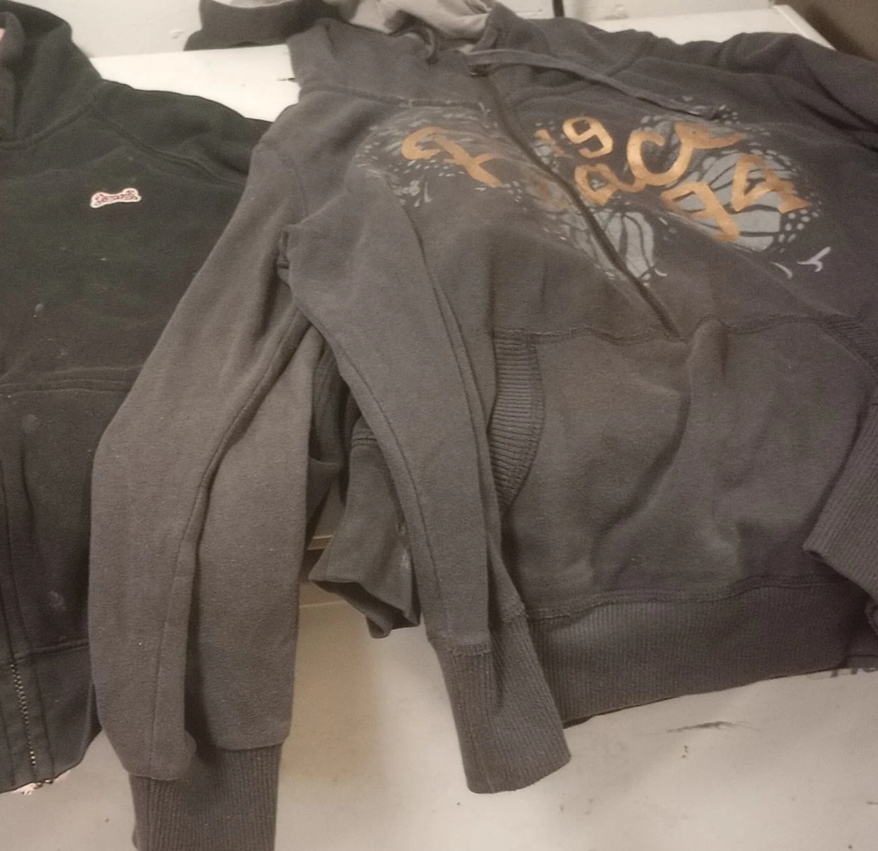 Two Hoodies: Black & Gray Graphic