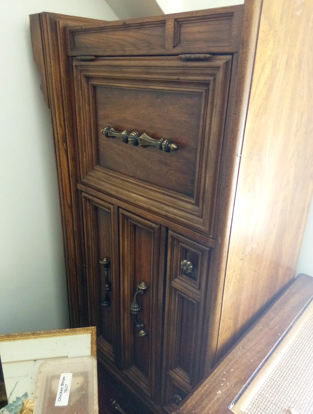 Vintage Wooden Cabinet with Ornate Handles