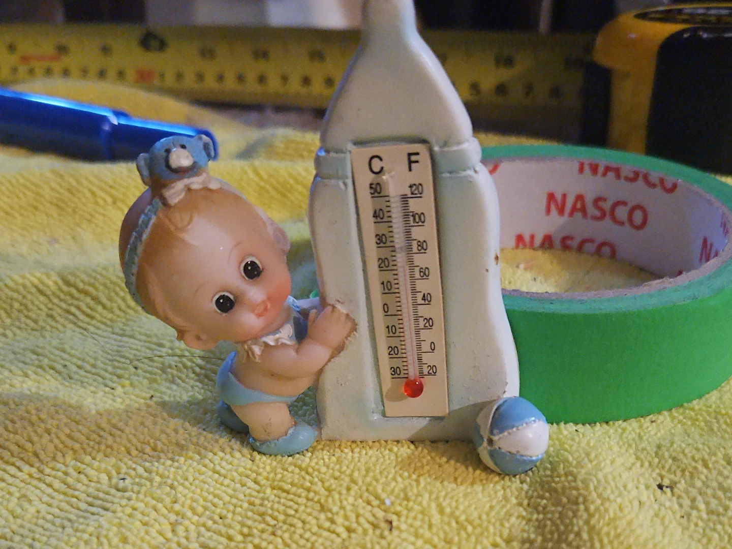 Baby Figurine with Thermometer
