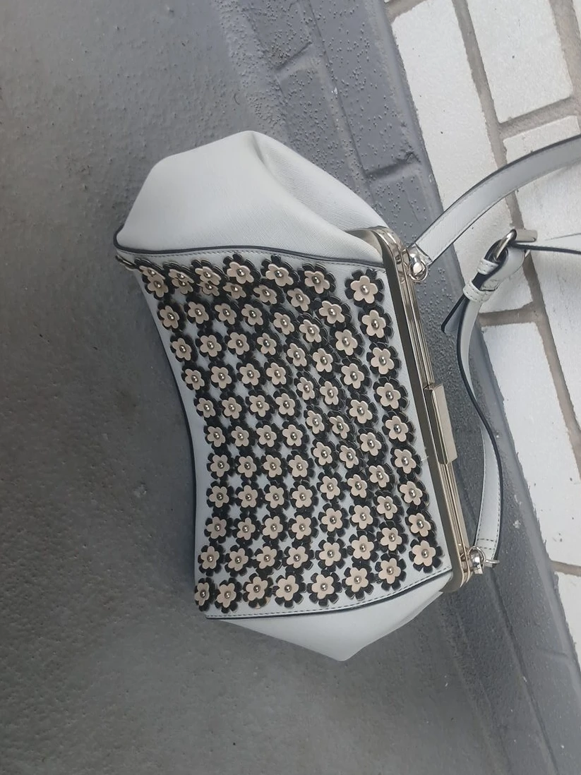 White and floral clutch/purse