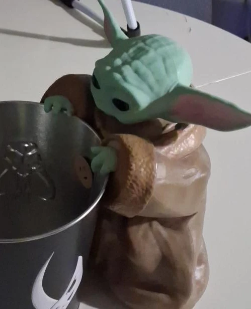 The Child "Baby Yoda" popcorn bucket.
