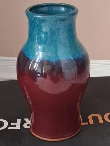 Ceramic vase with gradient blue and red glaze