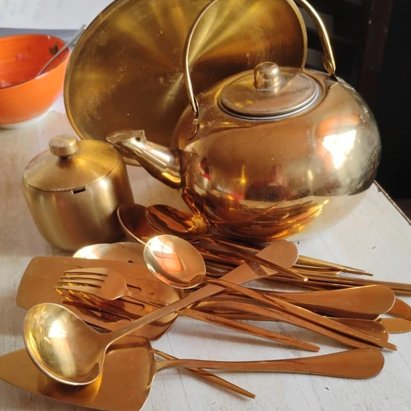 Gold Tone Teapot and Cutlery Set