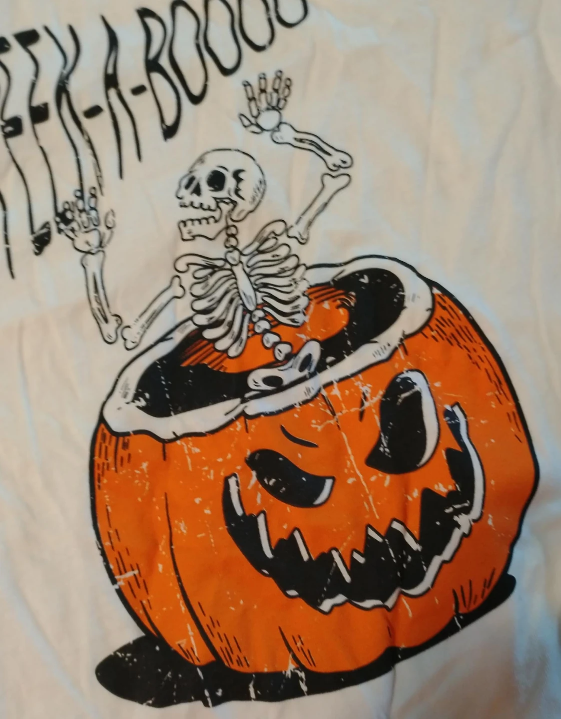 Peek-A-Boo Skeleton in Pumpkin Halloween T-Shirt