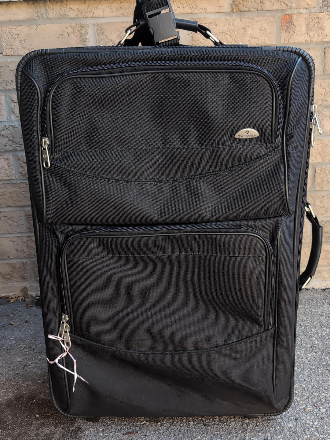 Samsonite Black Rolling Suitcase