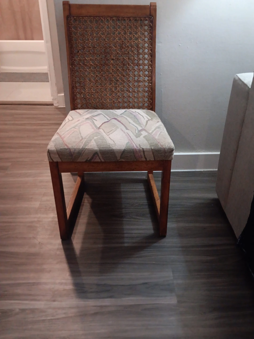 Wooden accent chair with cane back and upholstered seat
