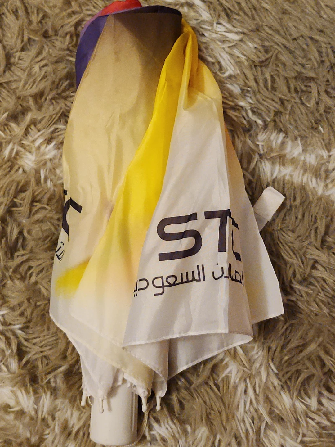 STC Branded Yellow and White Umbrella