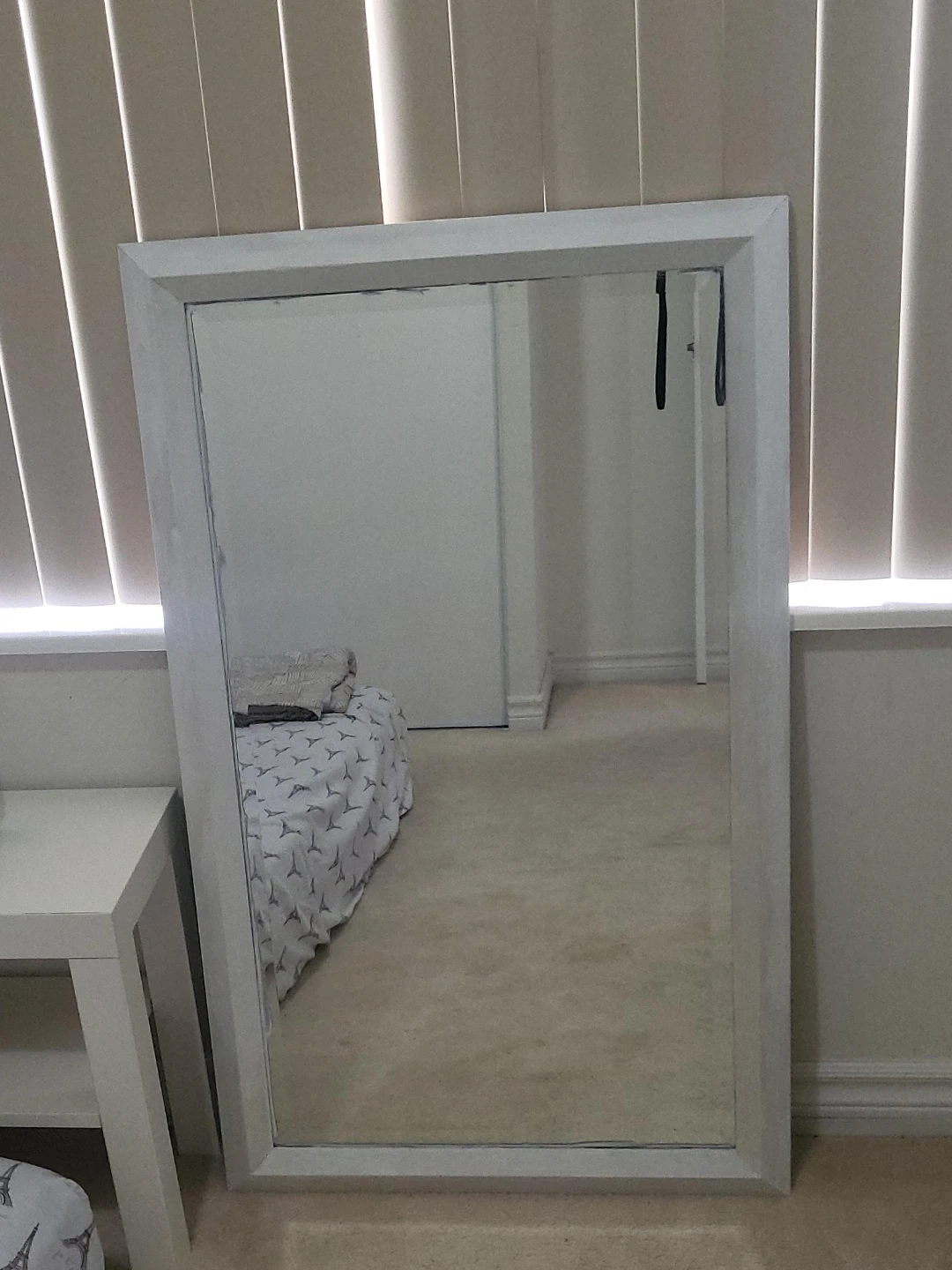 Large white framed wall mirror