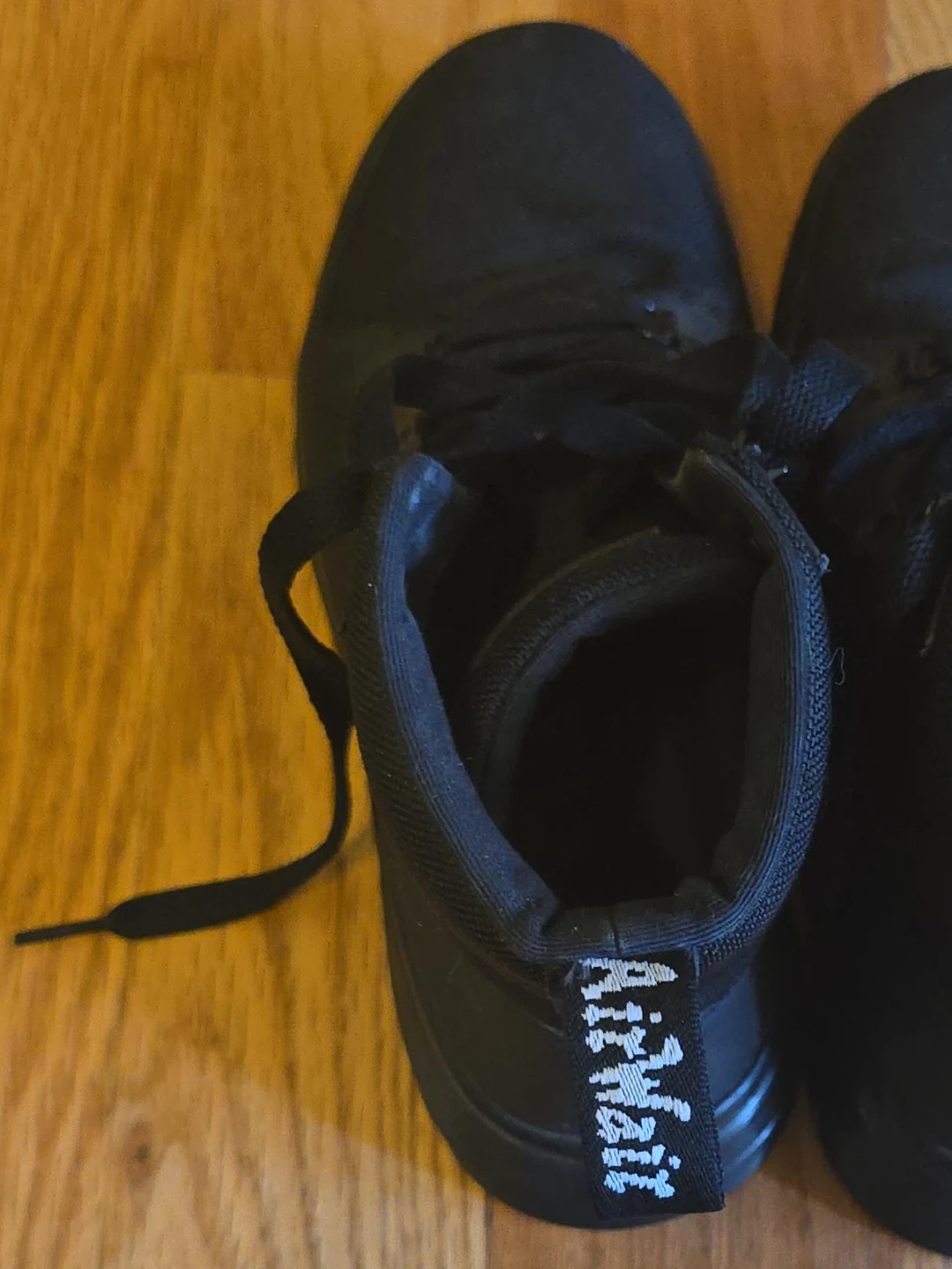 Dr. Martens Black High Top Sneakers