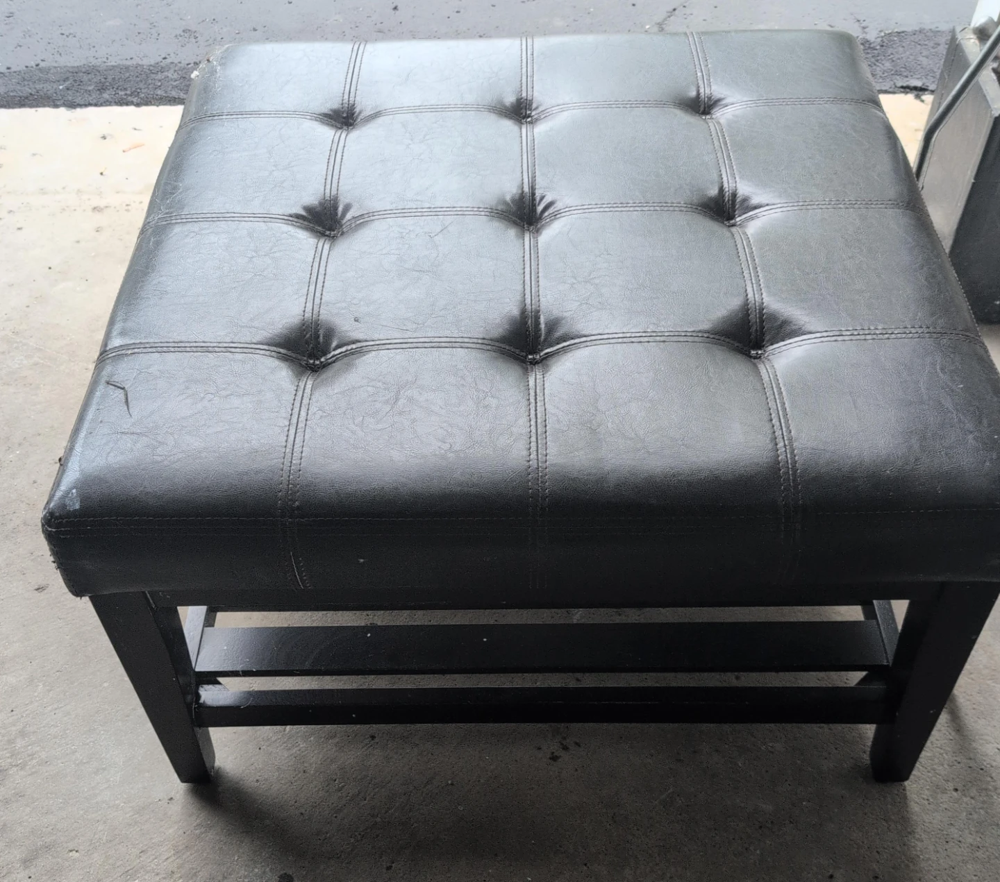 Black Tufted Faux Leather Ottoman pick up as it is