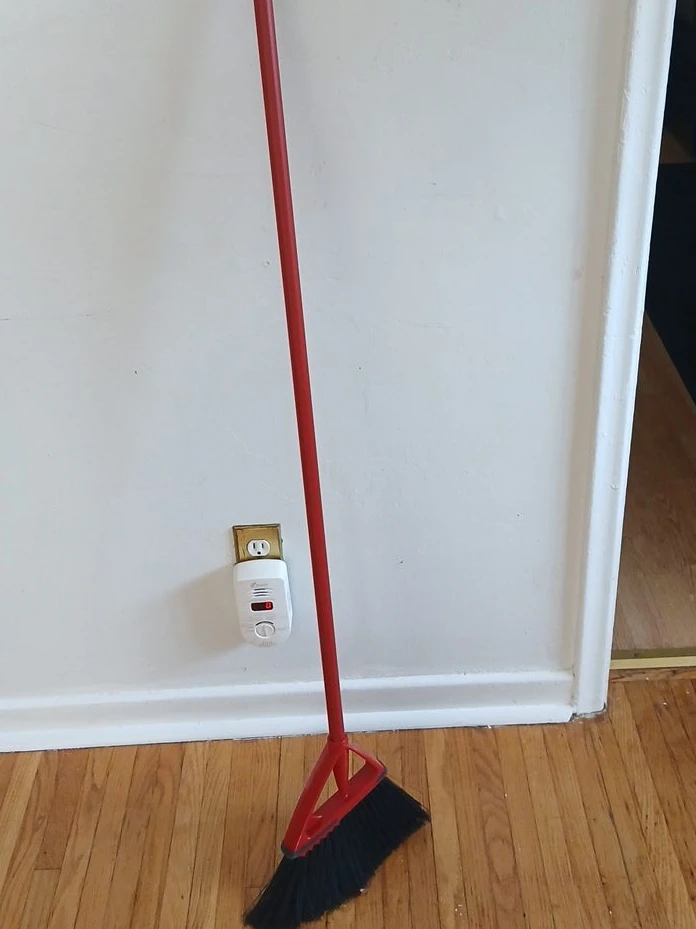 Red Broom with Black Bristles
