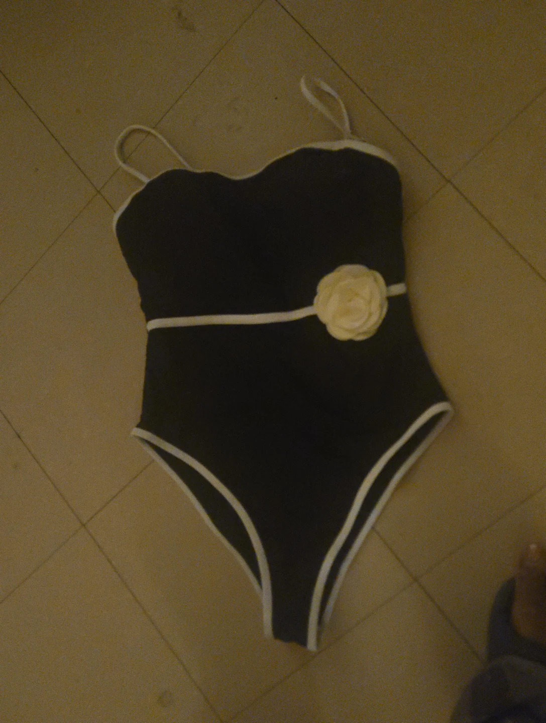 Black One-Piece Swimsuit with Floral Accent