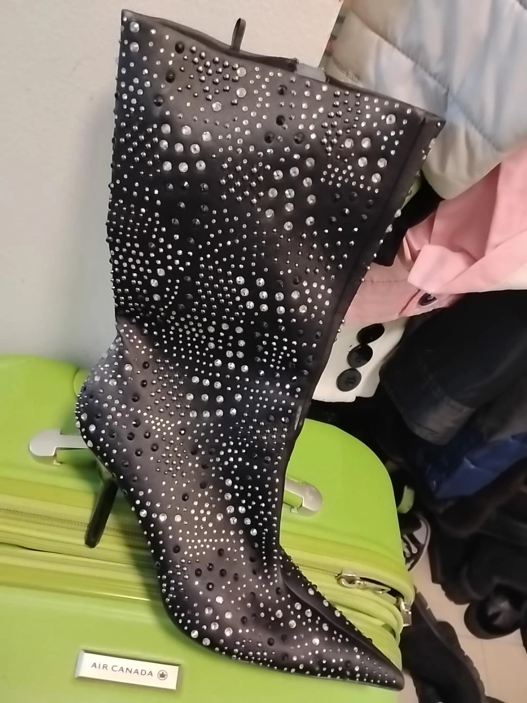 Black studded pointed-toe heeled boots
