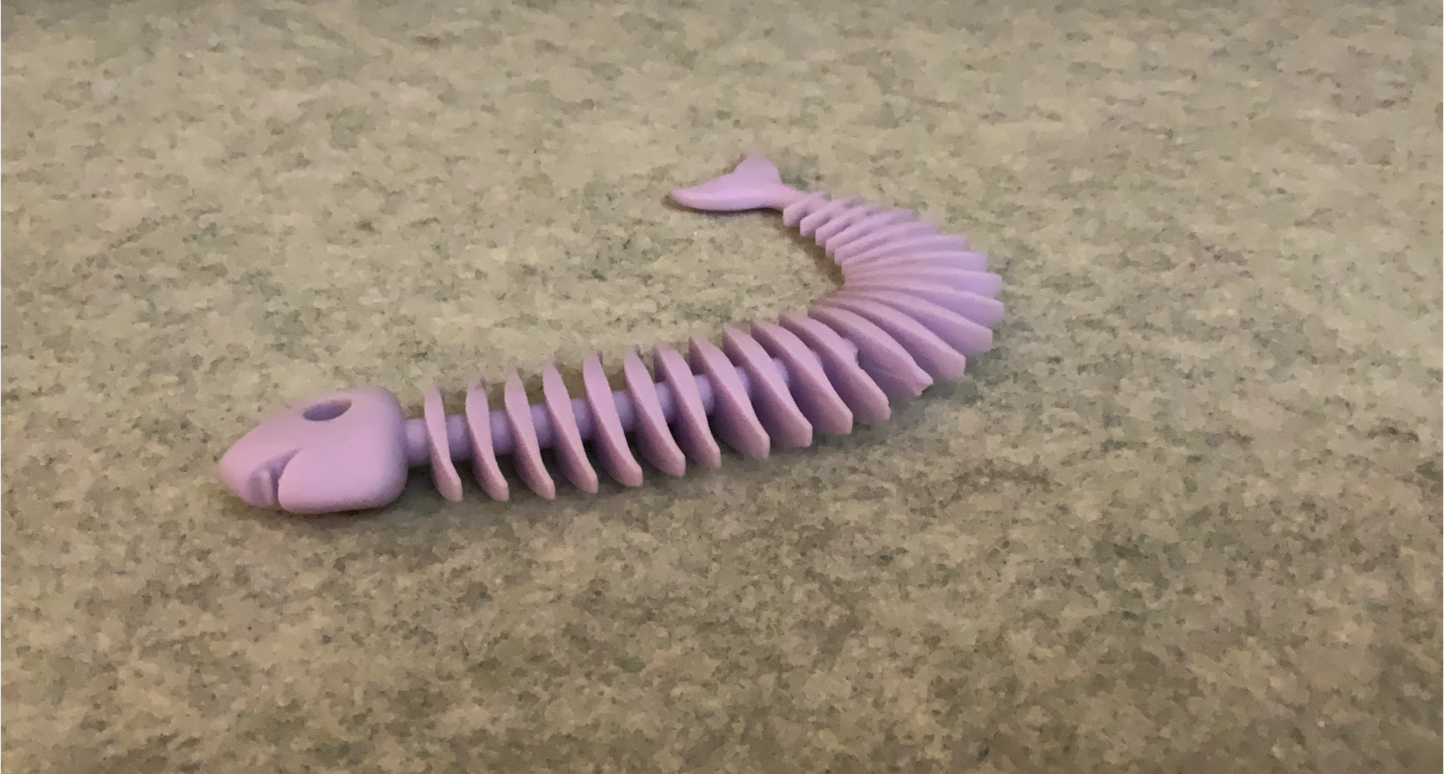 Purple stretchy Fish Skeleton Toy