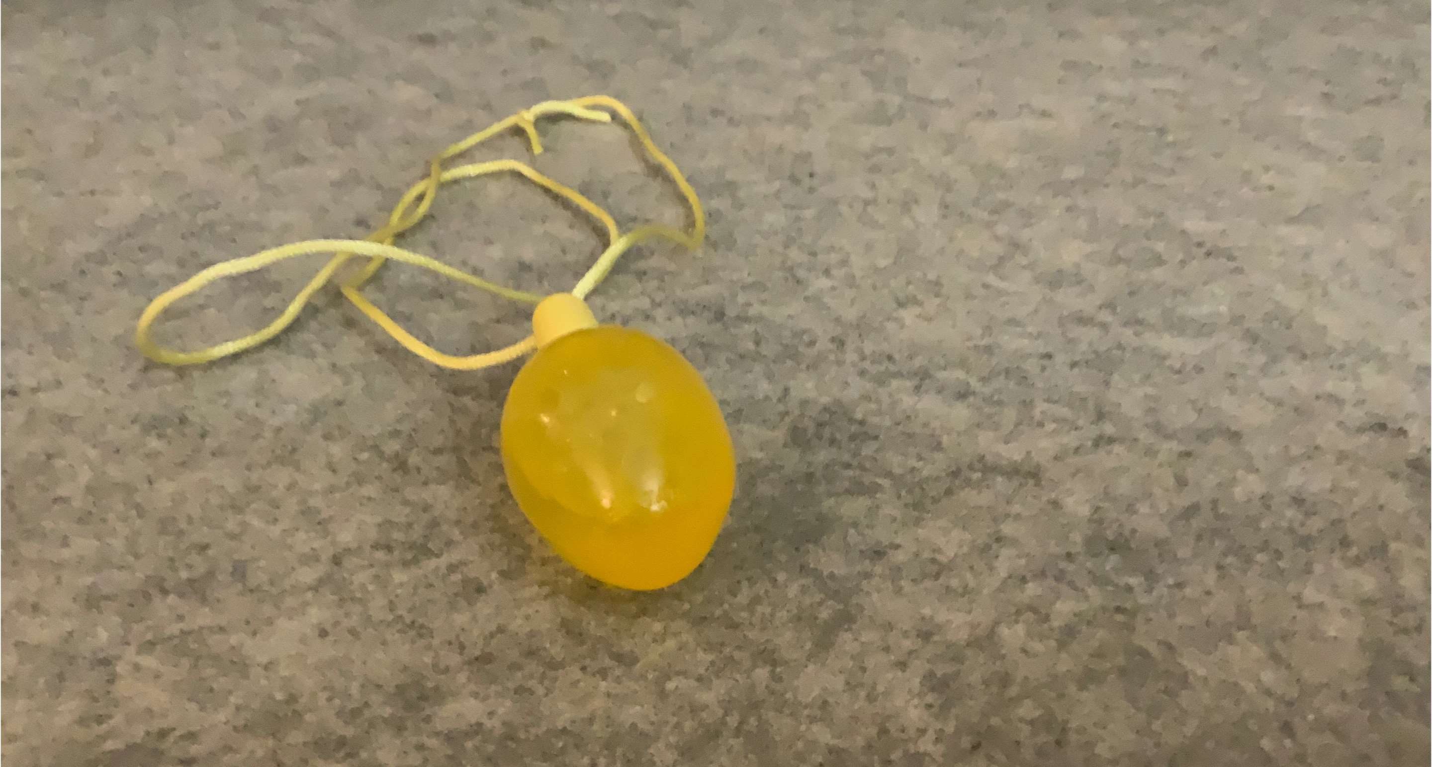 Yellow Egg Shaped Necklace with bubbles