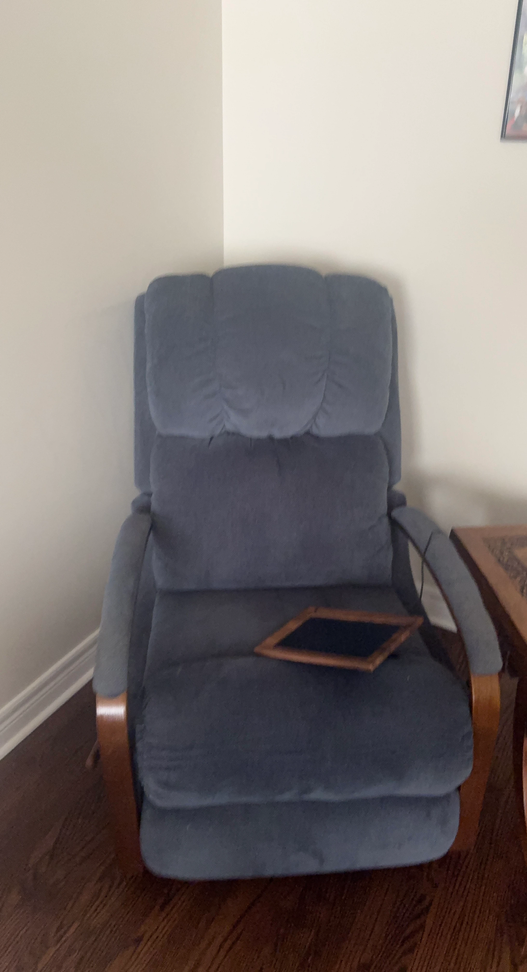 Blue upholstered rocking recliner chair