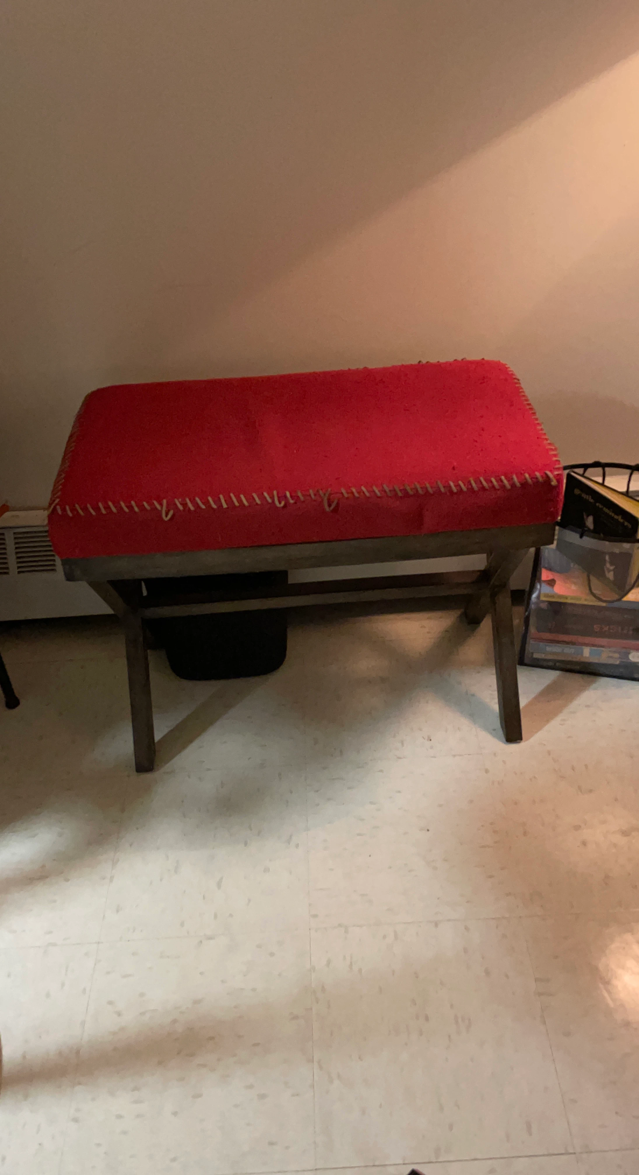 Red Upholstered Bench with Stitched Accents