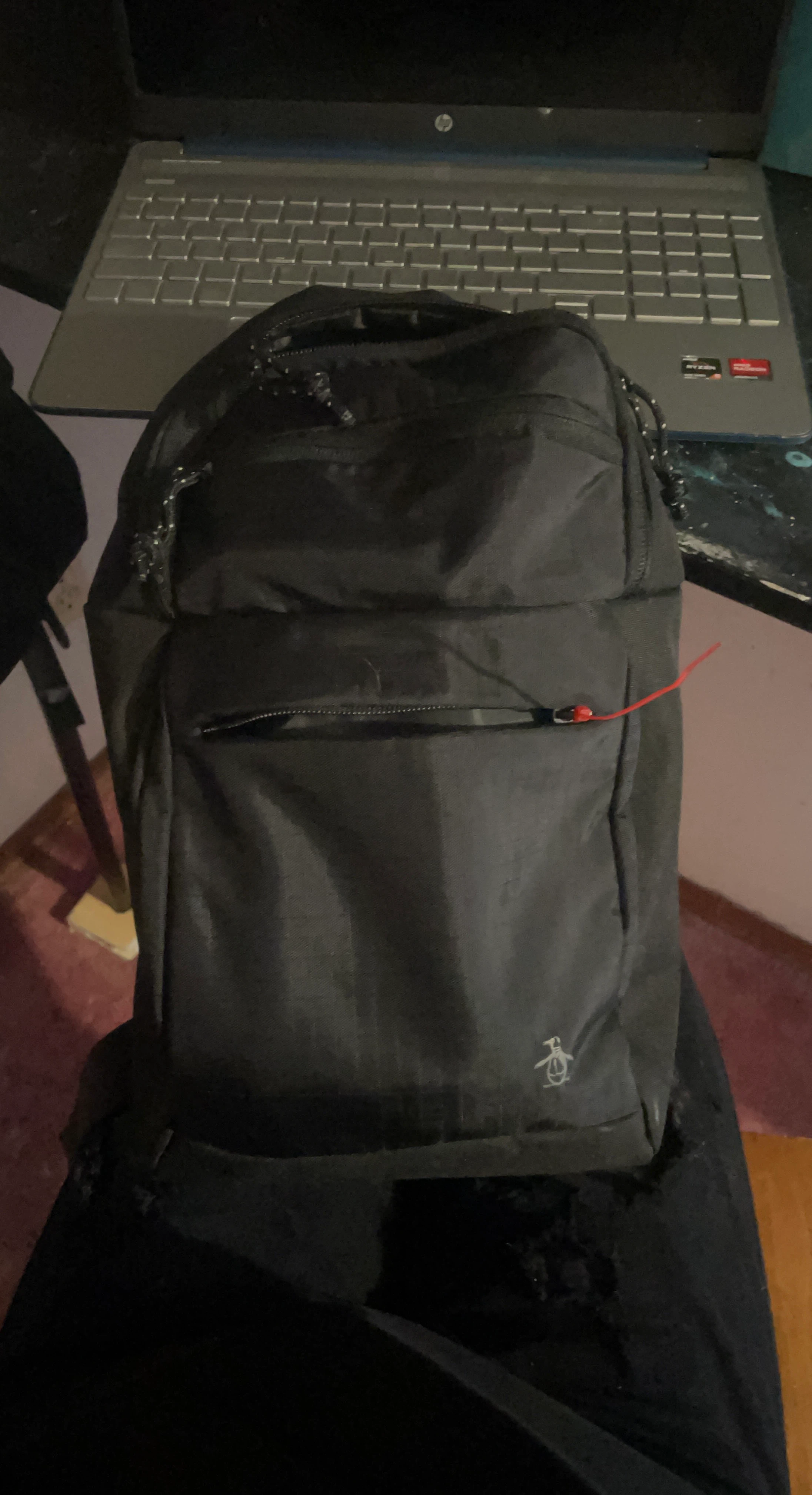 Black Penguin Backpack