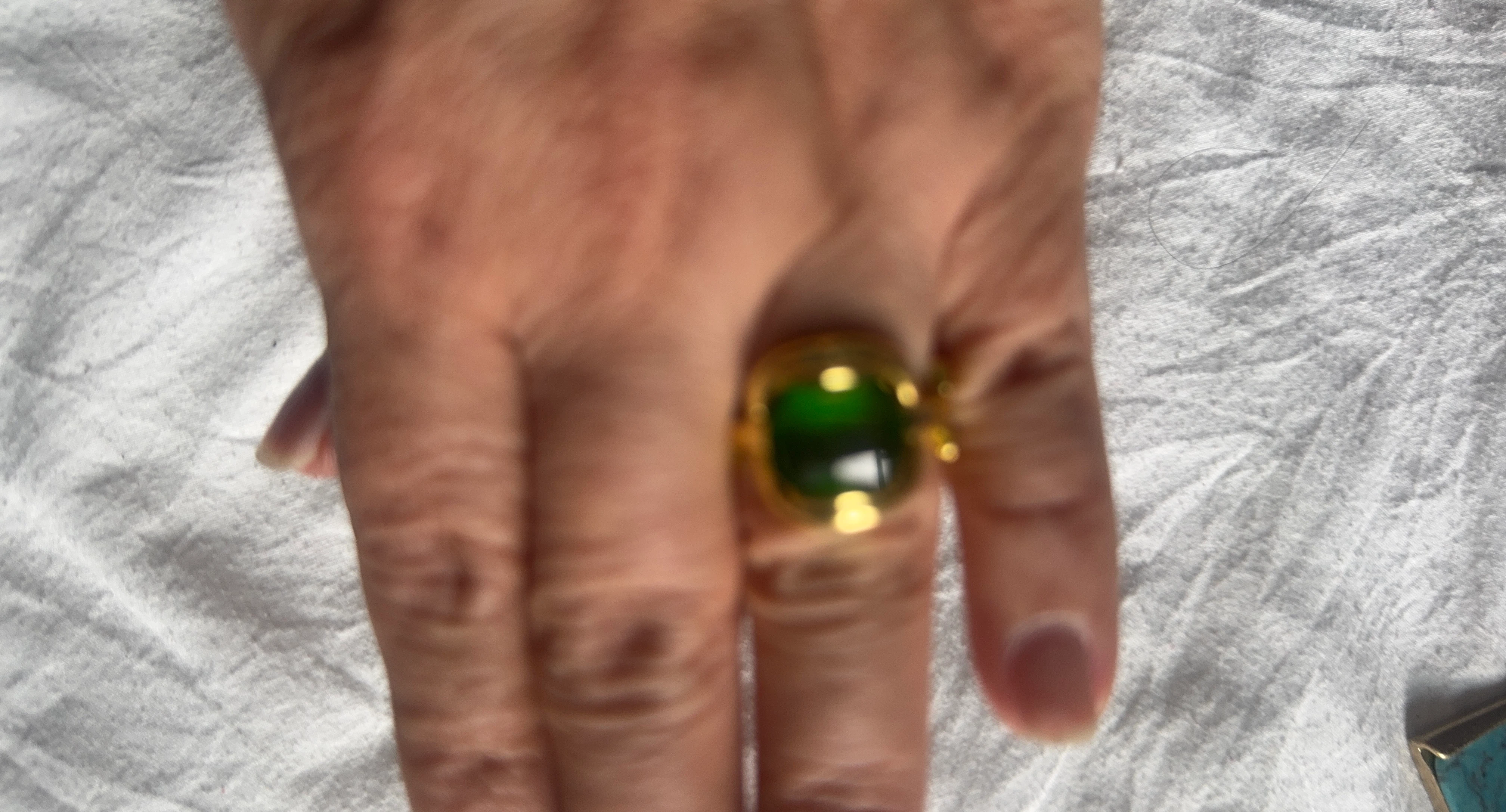 Gold Tone Ring with Emerald Green Stone