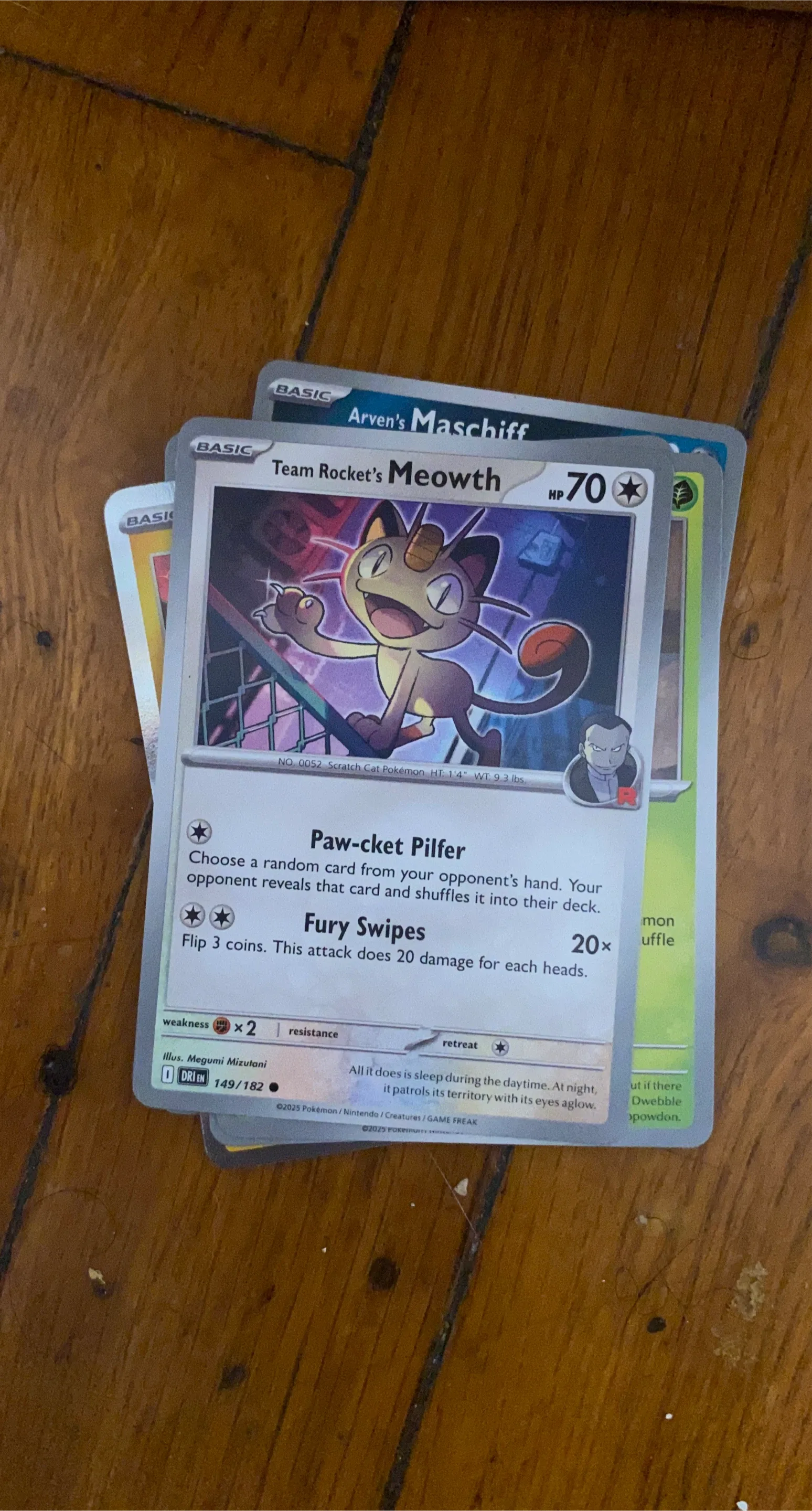 Team Rocket's Meowth Pokemon Trading Card