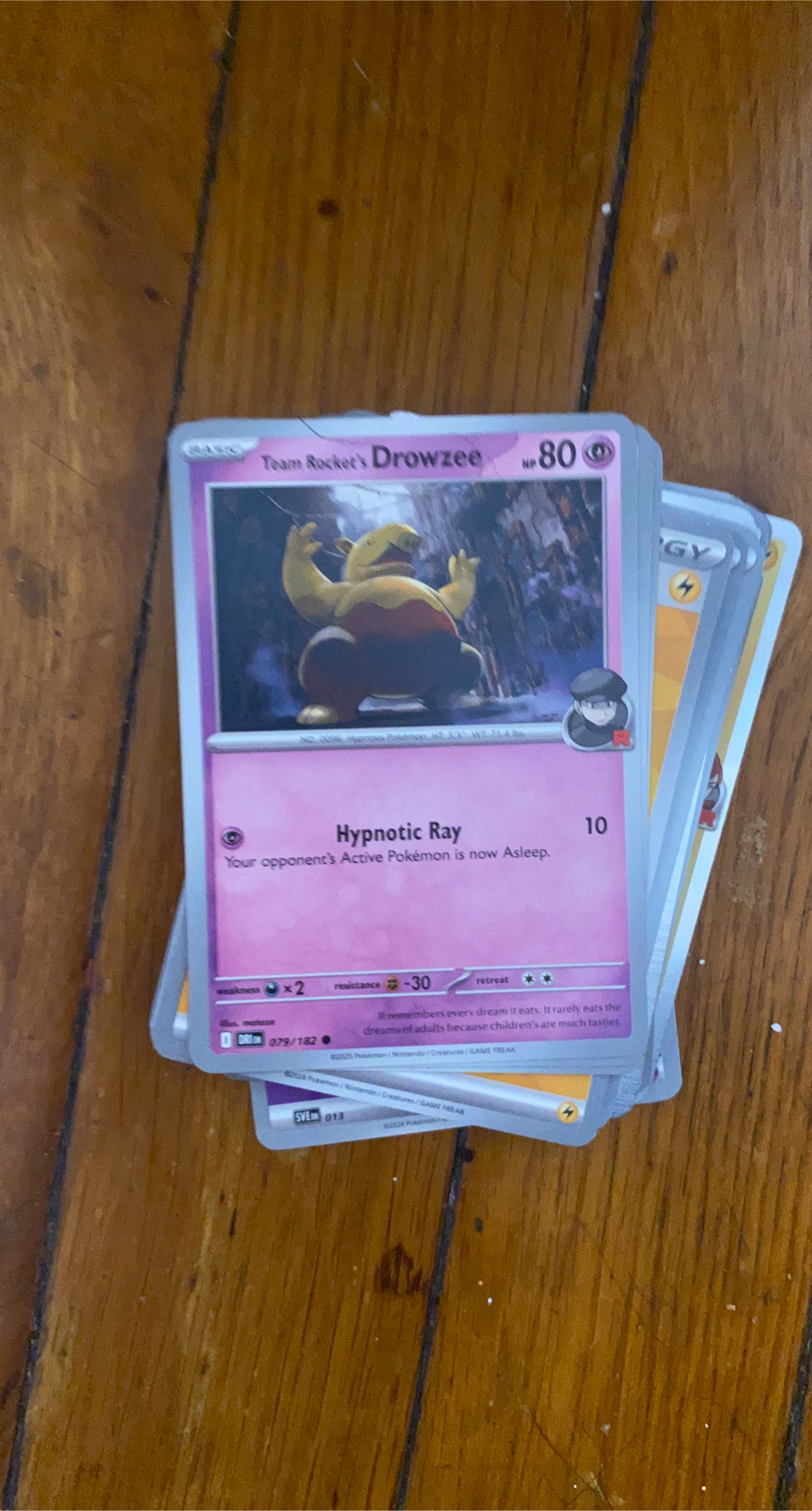 Team Rocket's Drowzee Pokemon Card 079/182