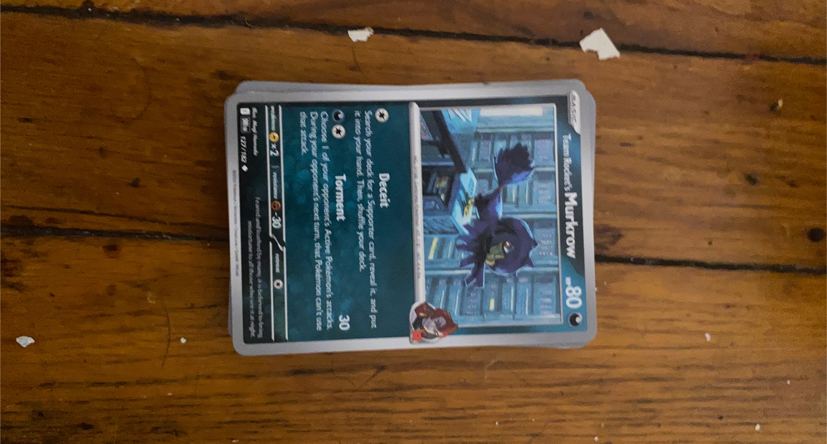 Team Rocket's Murkrow Pokemon Card 127/182