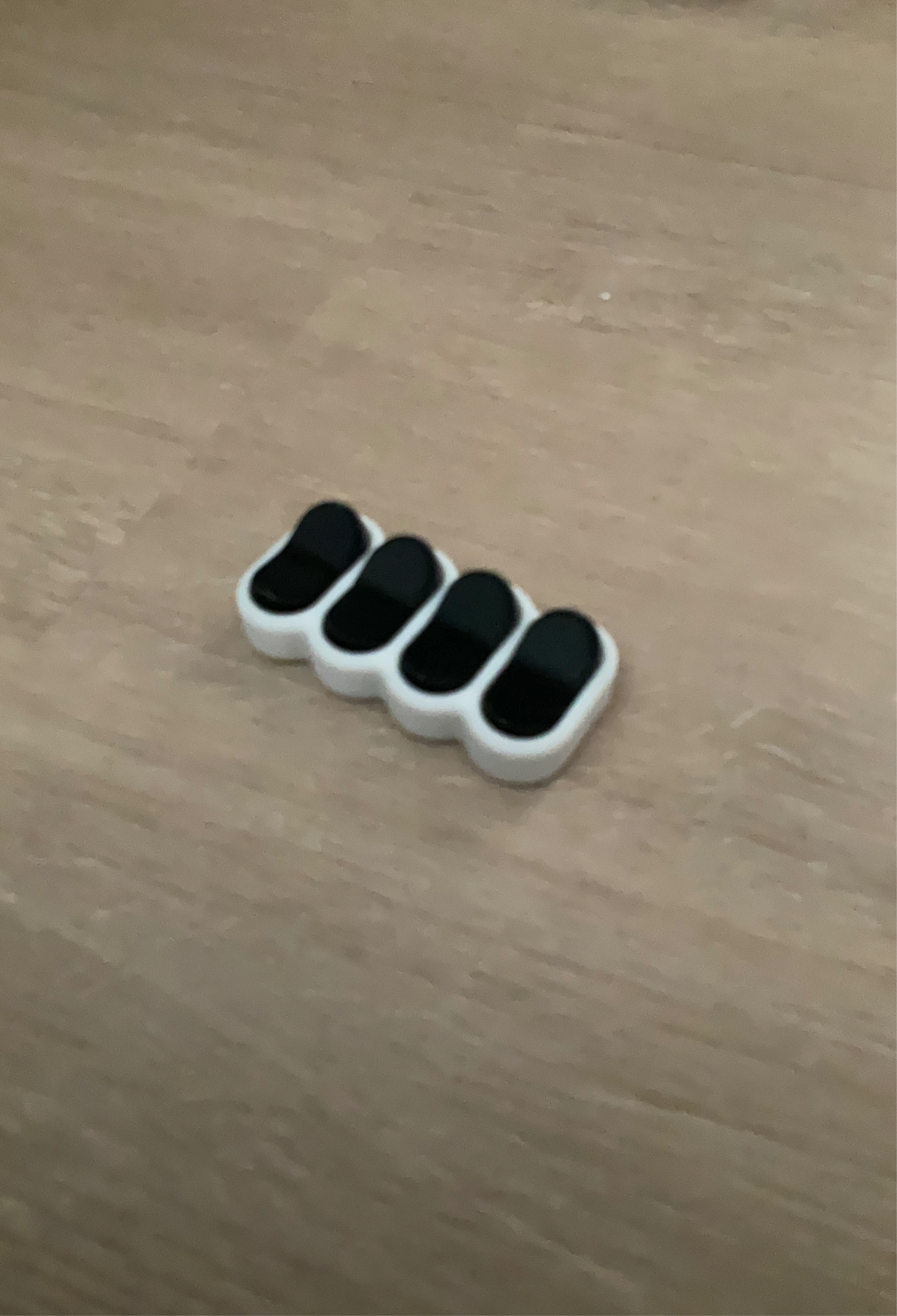 Black and white clicker toy