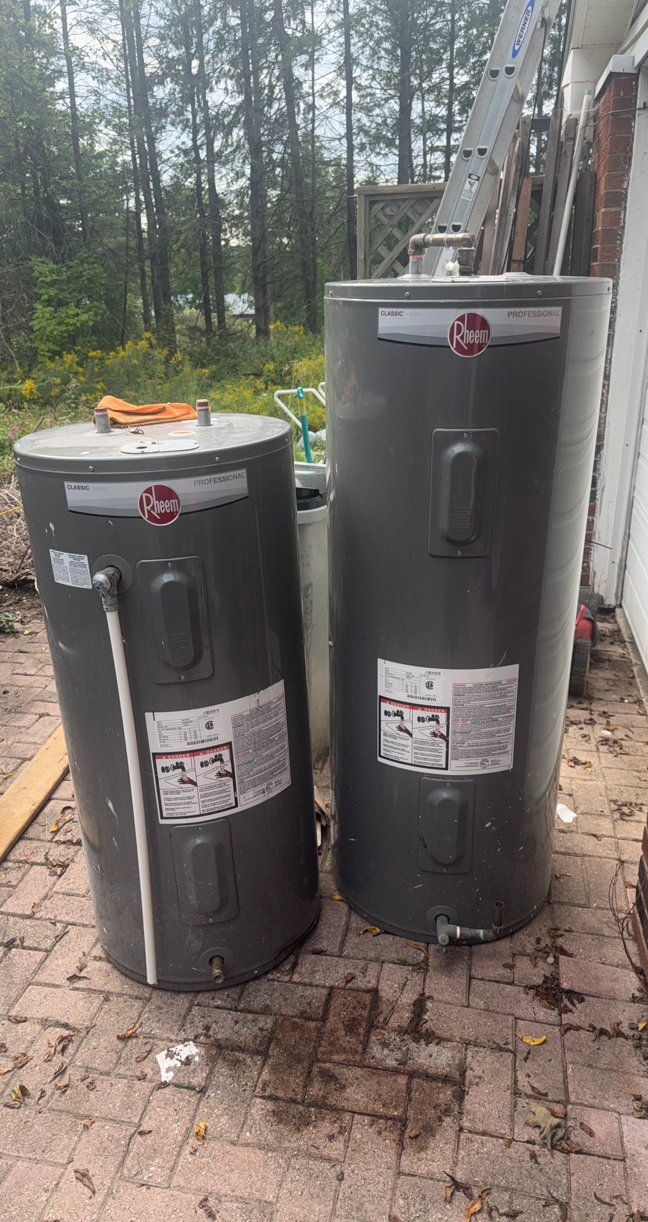 Two Rheem Professional Classic Series Electric Water Heaters
