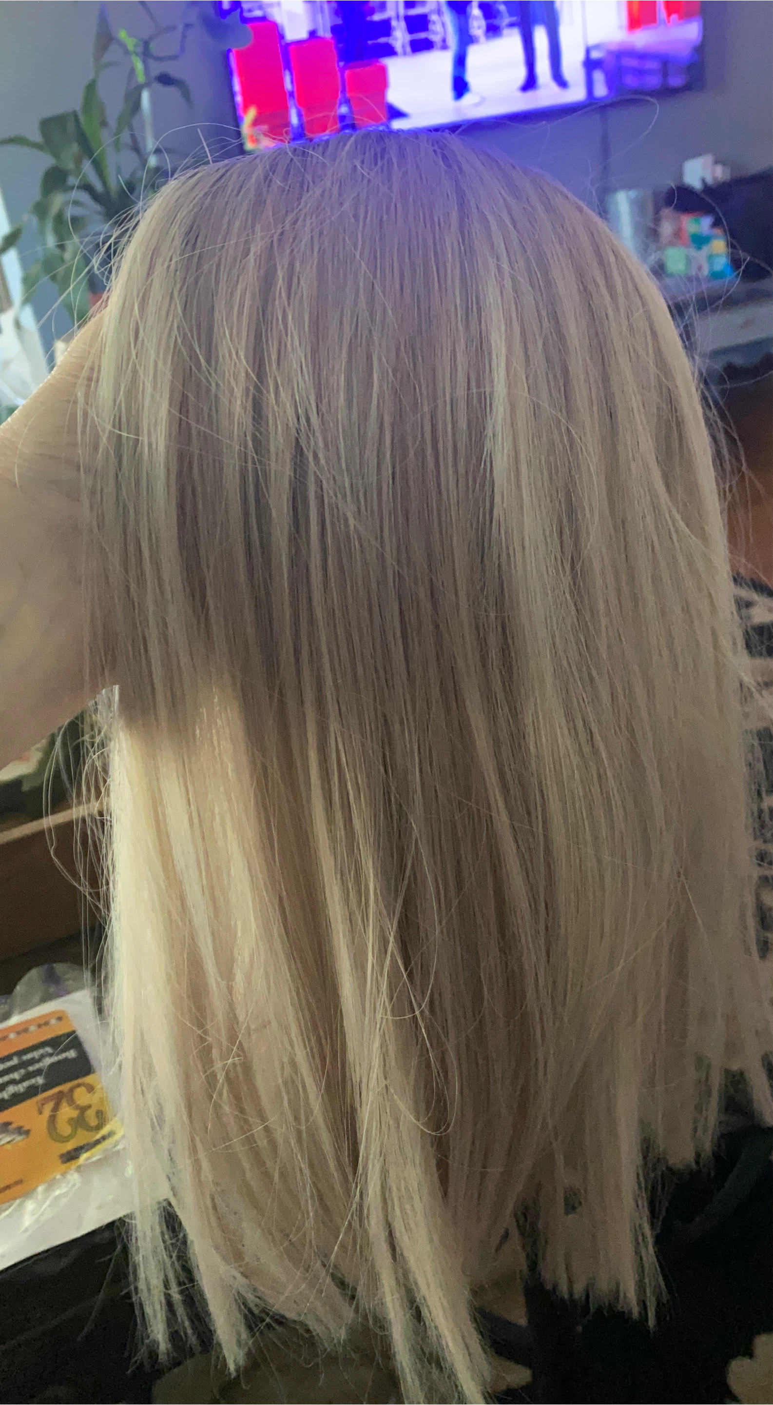 Blonde shoulder-length wig