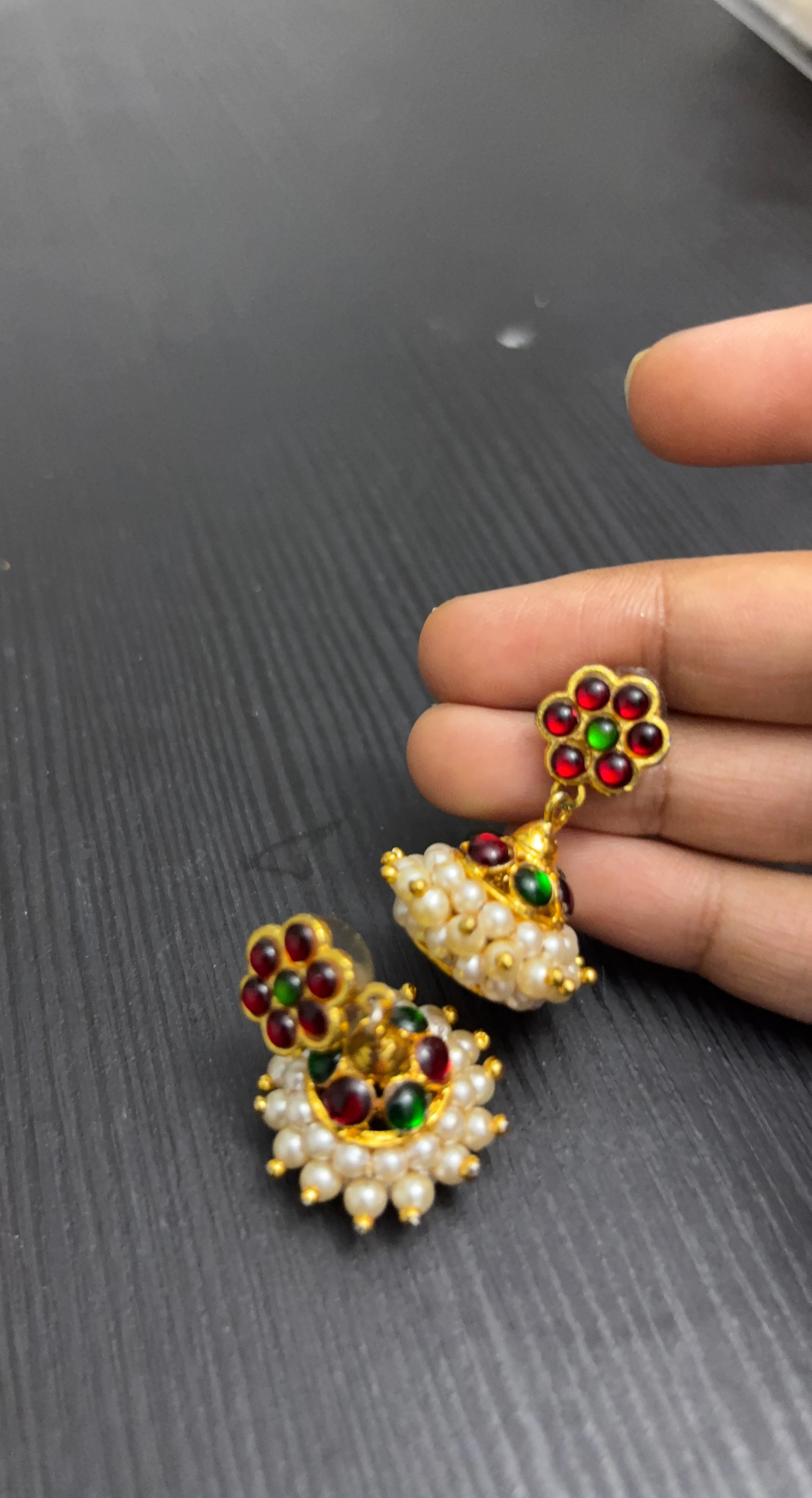 Gold-tone Jhumka Earrings with Red and Green Stones