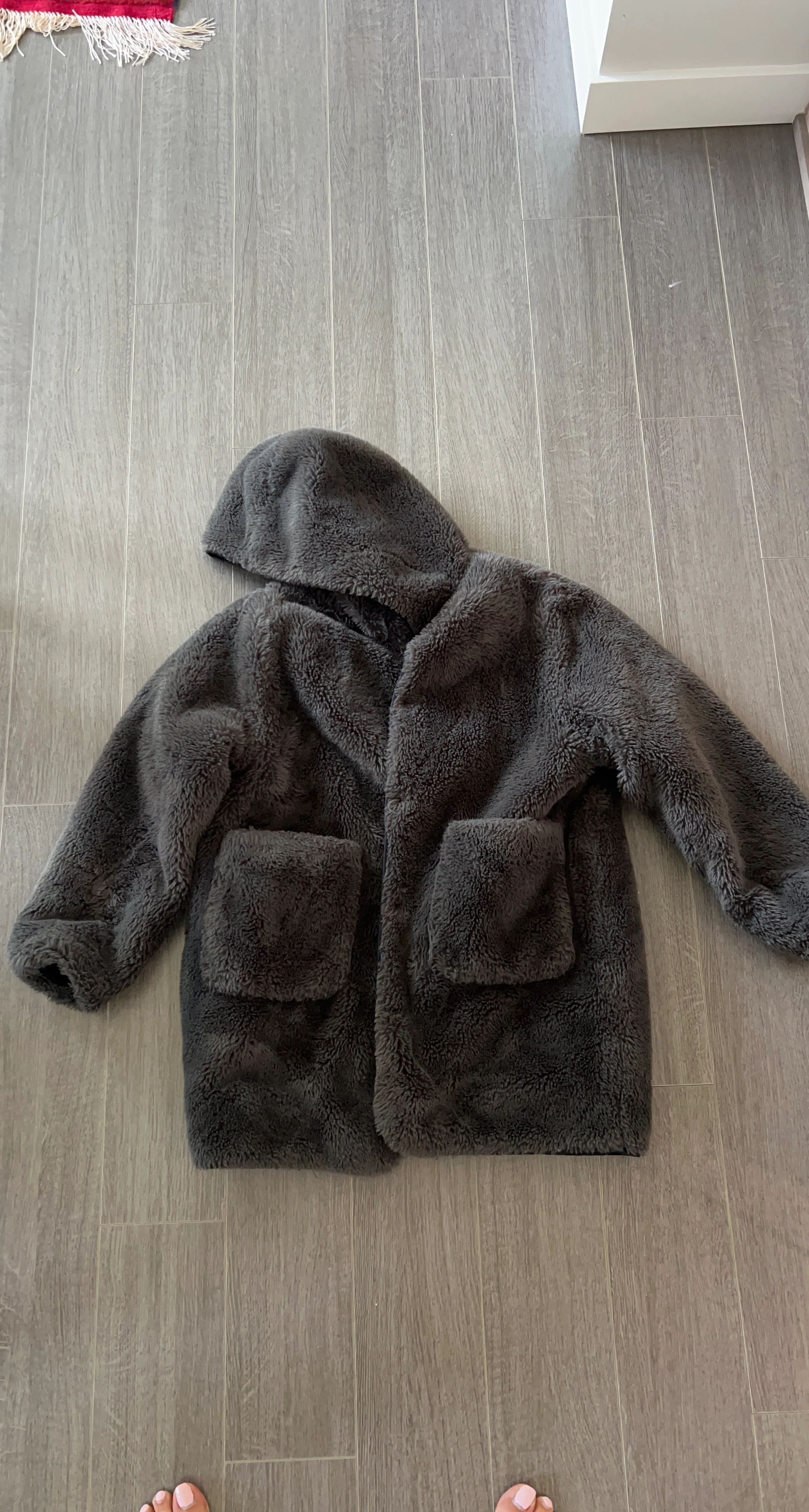 Grey faux fur hooded jacket.Zara