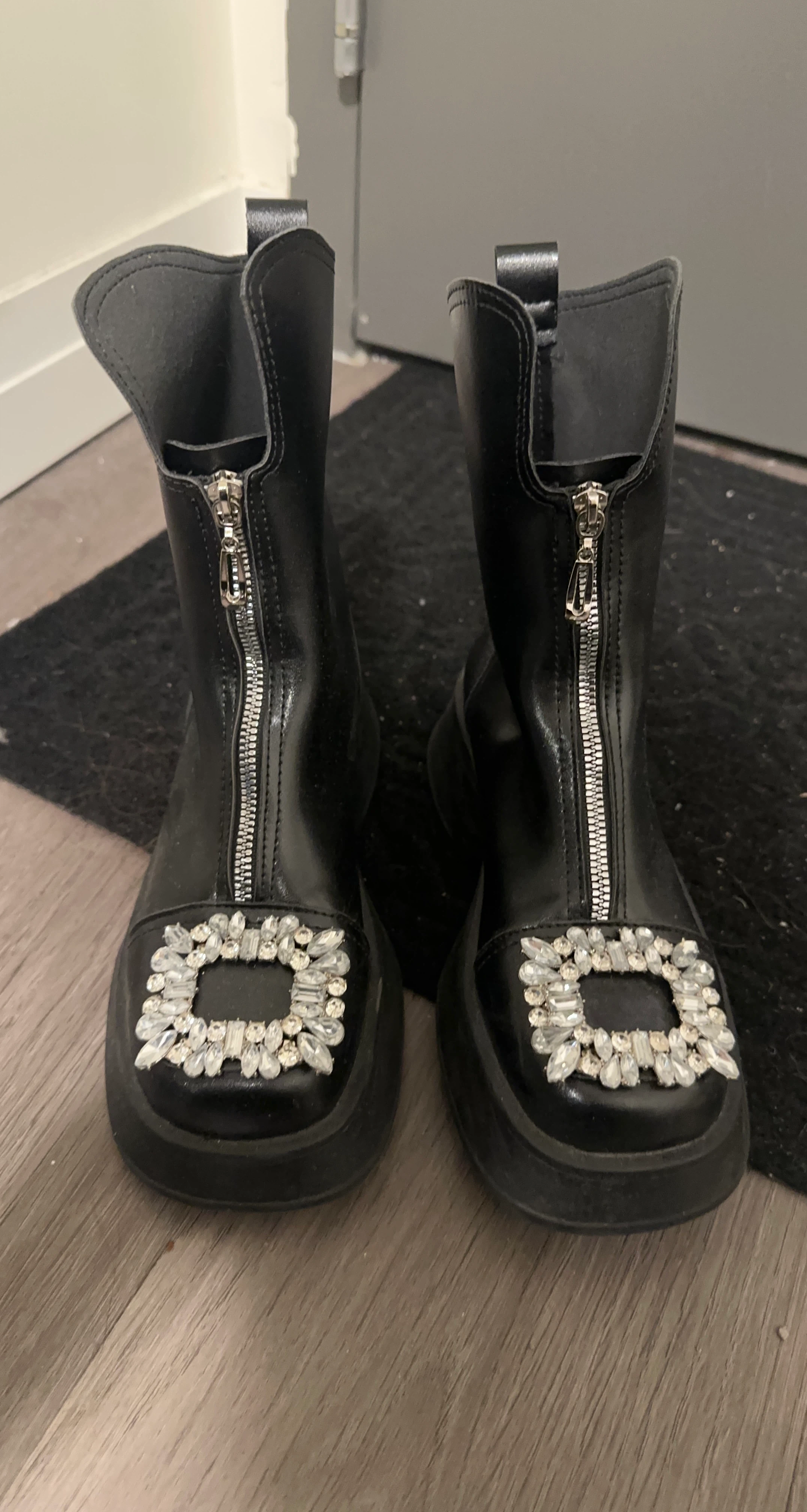 Black boots with crystal embellishment