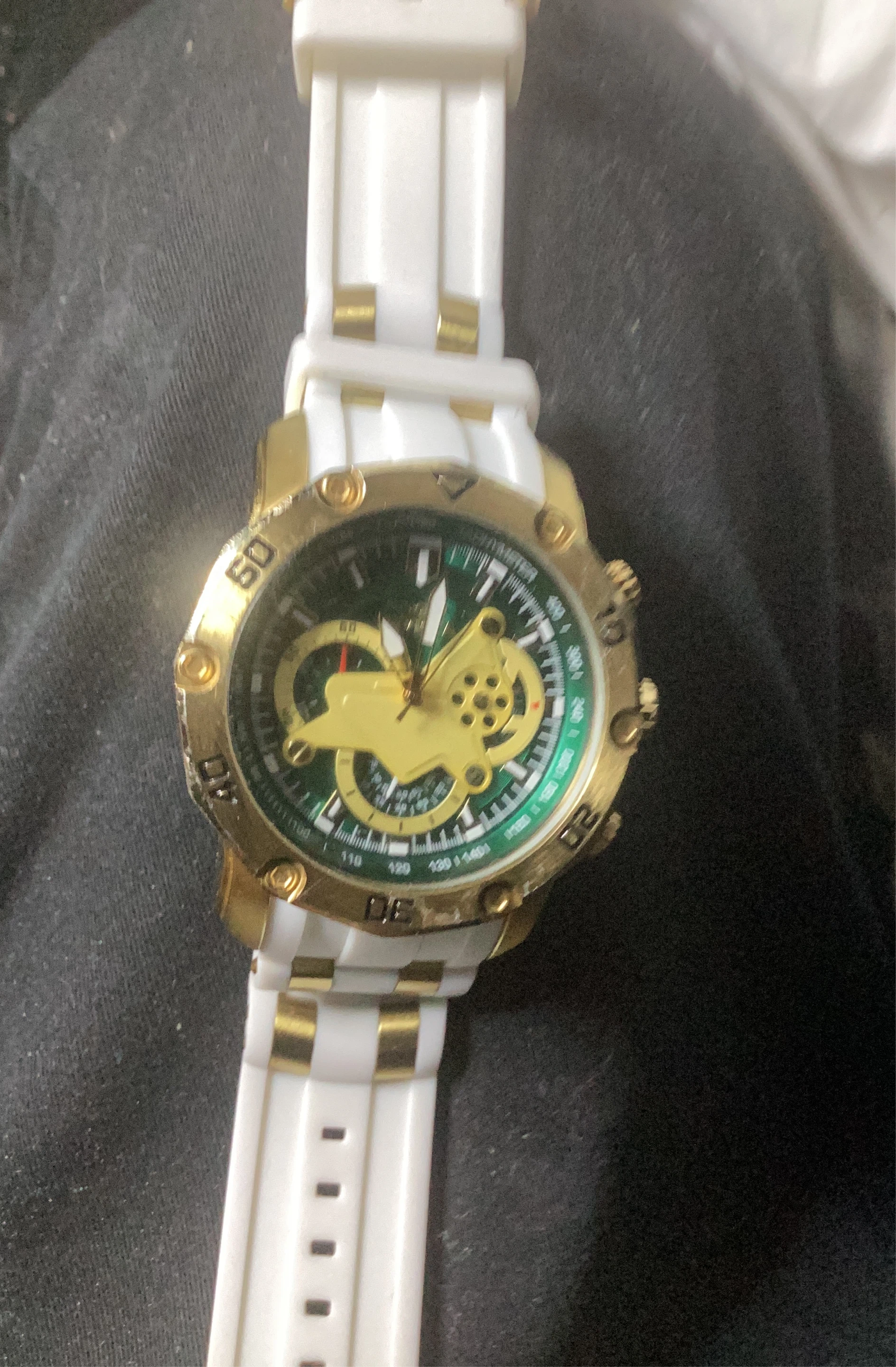 Gold and White Analog Watch
