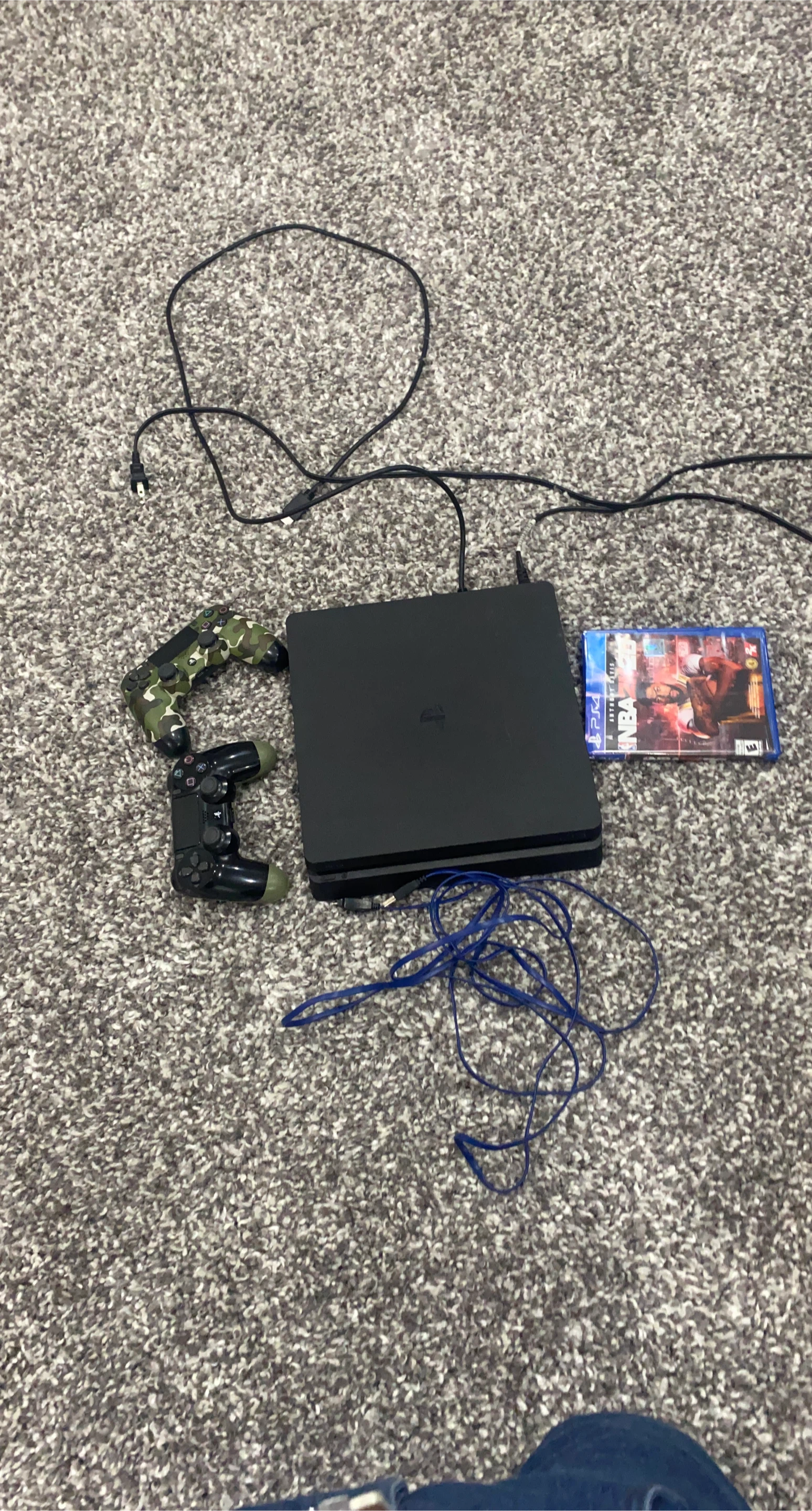 PlayStation 4 Slim Console with Two  Controllers and NBA 2K20