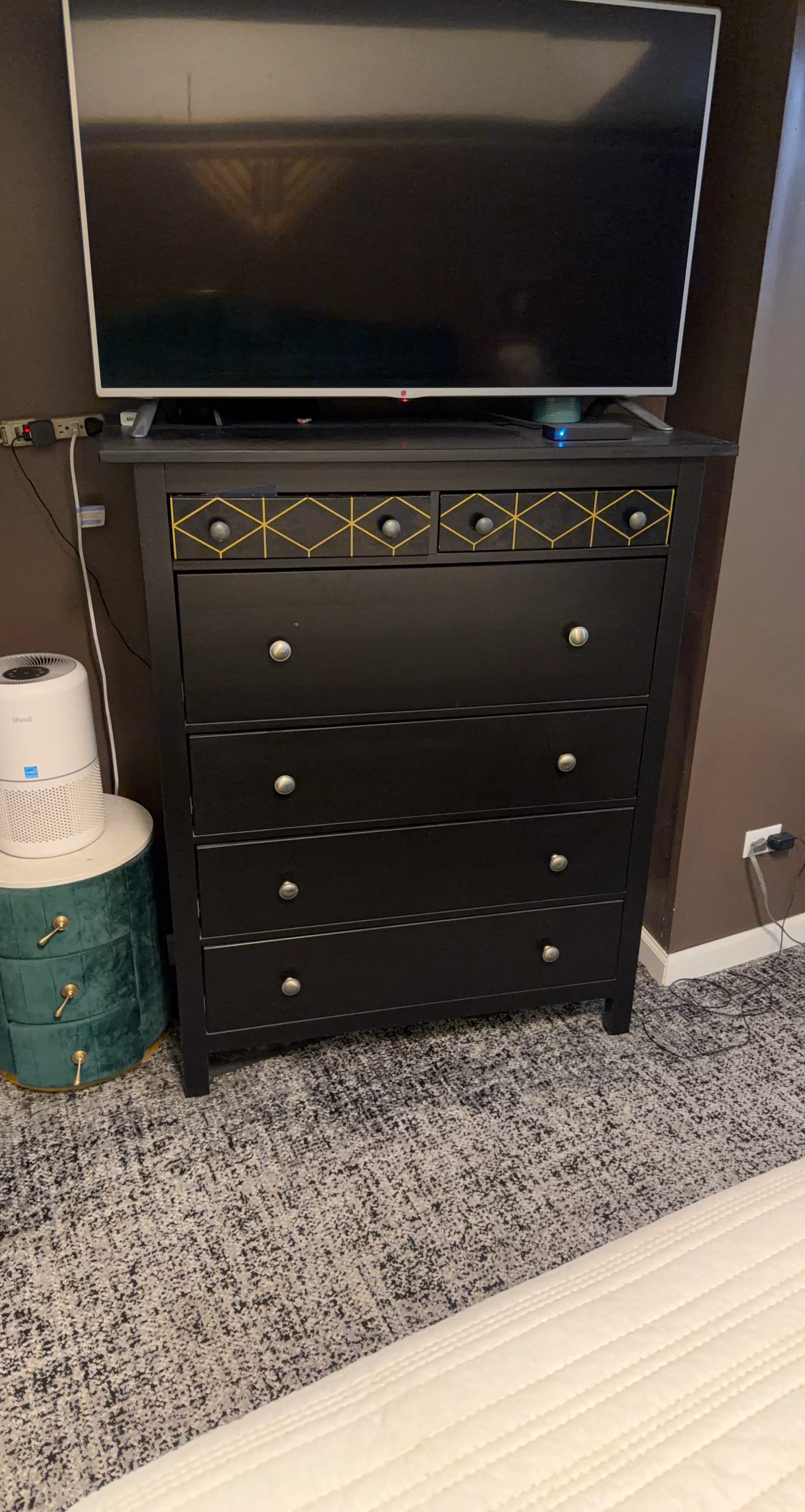 Black Wooden Dresser with Gold Geometric Detail
