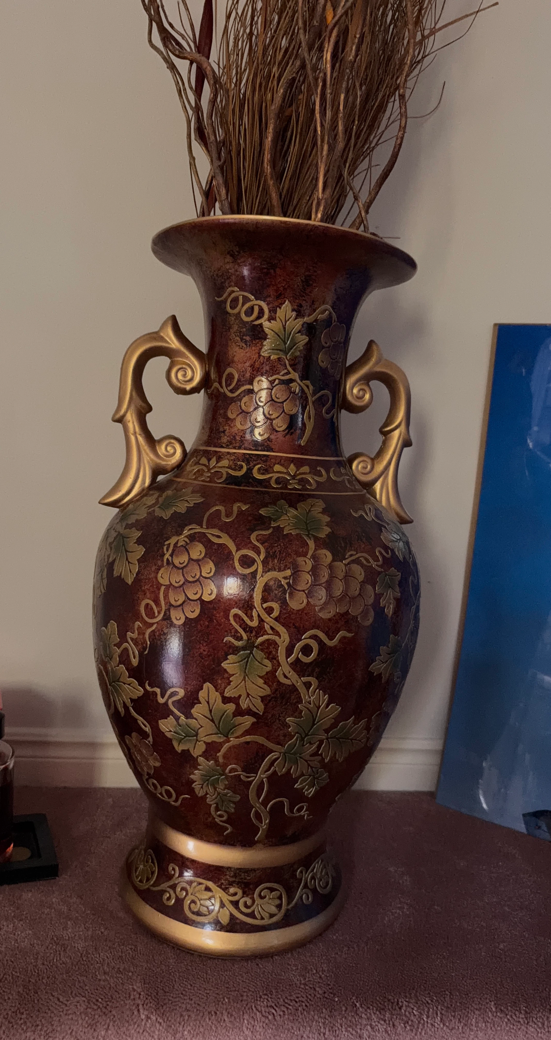 Large Decorative Vase with Grapevine Design
