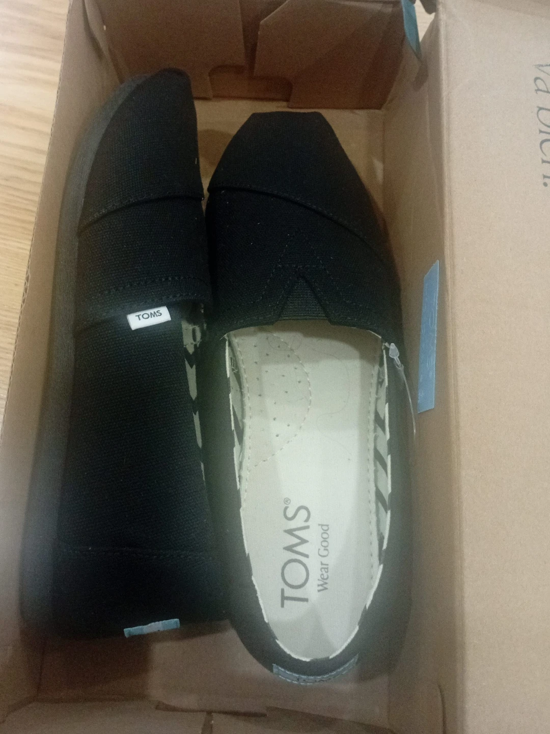 TOMS Black Canvas Slip-On Shoes