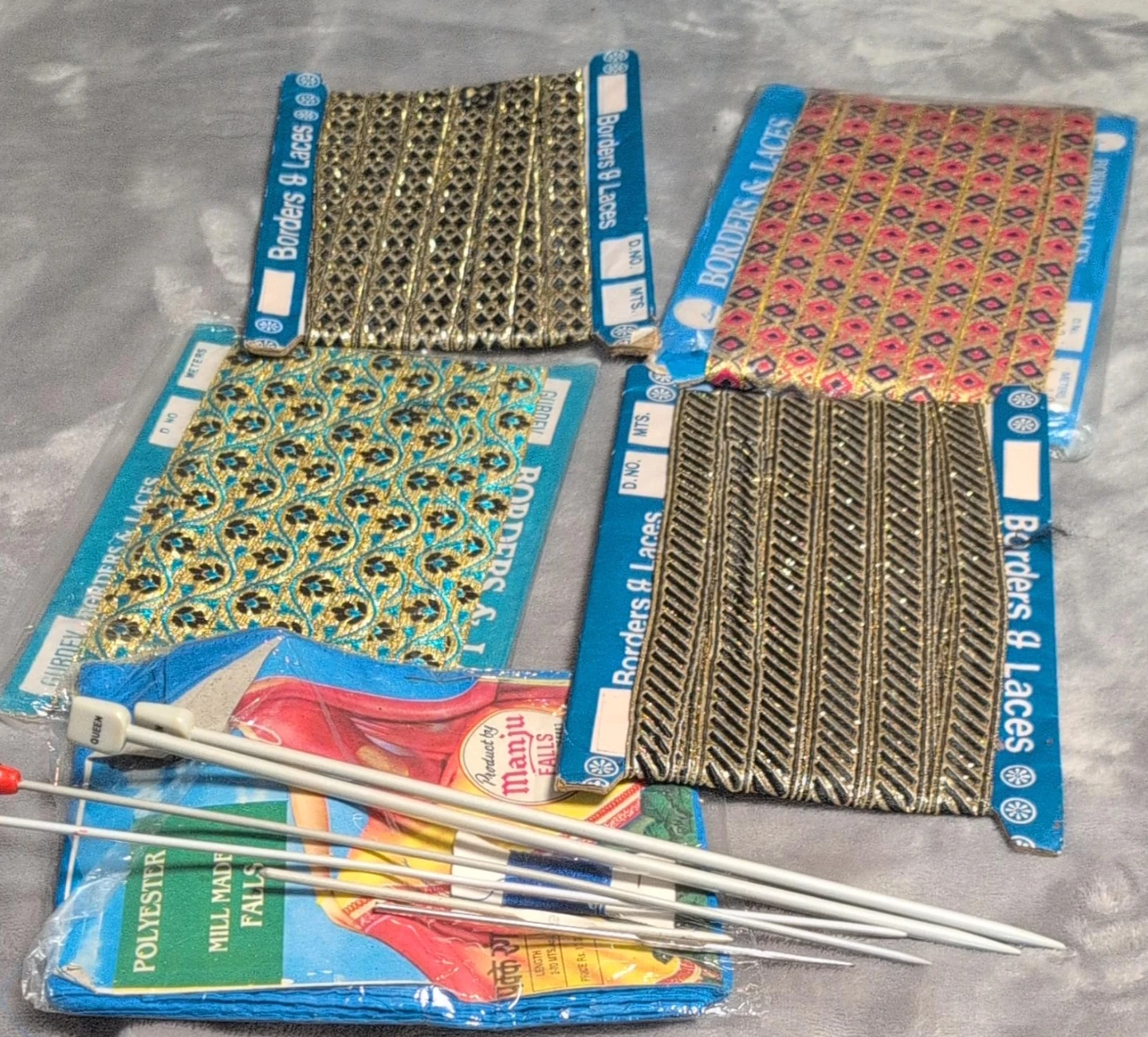 Assorted Decorative Borders, Laces, and Knitting Needles