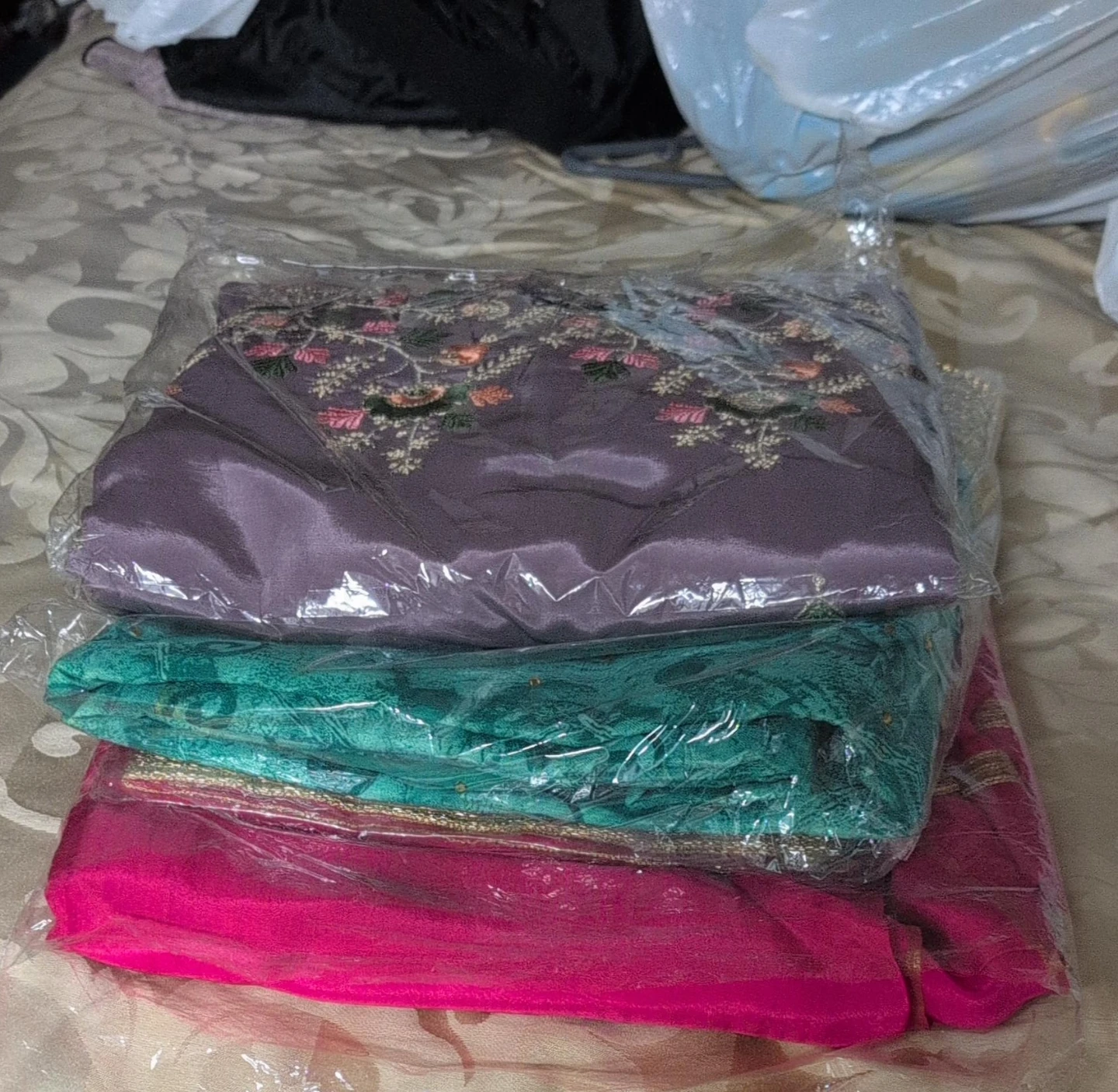 Three-piece traditional embroidered outfit unstitched $25 each