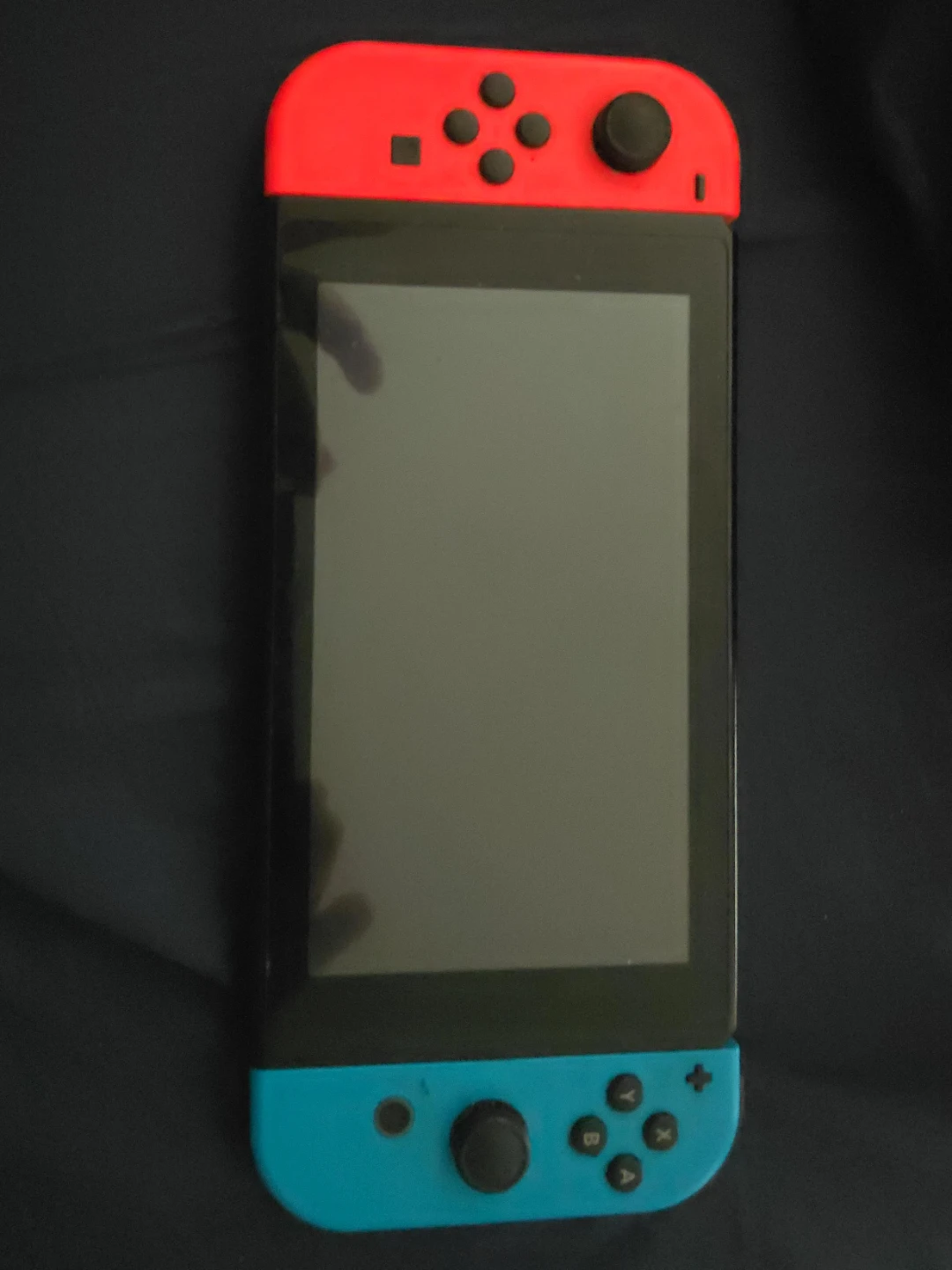 Nintendo Switch Console with Neon Red and Blue Joy-Cons