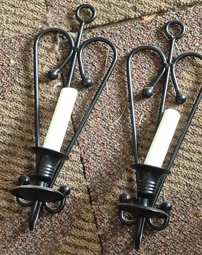 Two Black Wrought Iron Wall Sconces
