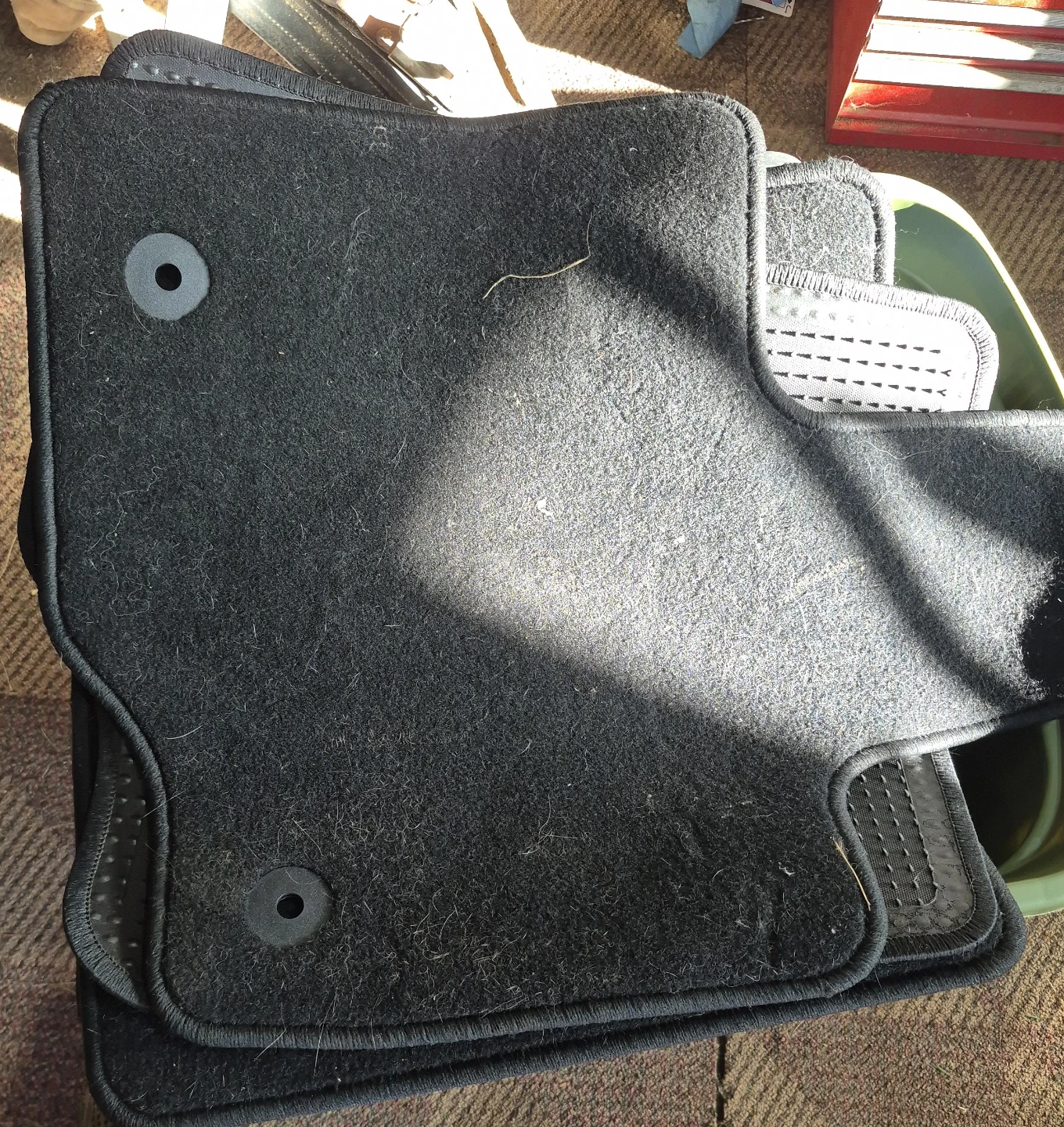 Set of black vehicle floor mats