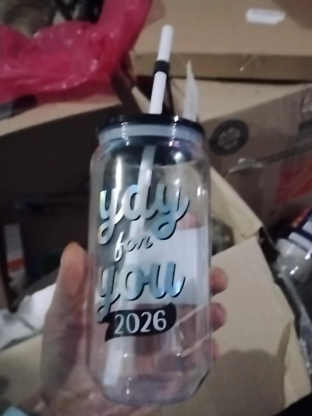 Clear plastic can-shaped tumbler with straw