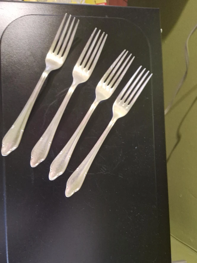 Set of 4 silvertone  steel forks