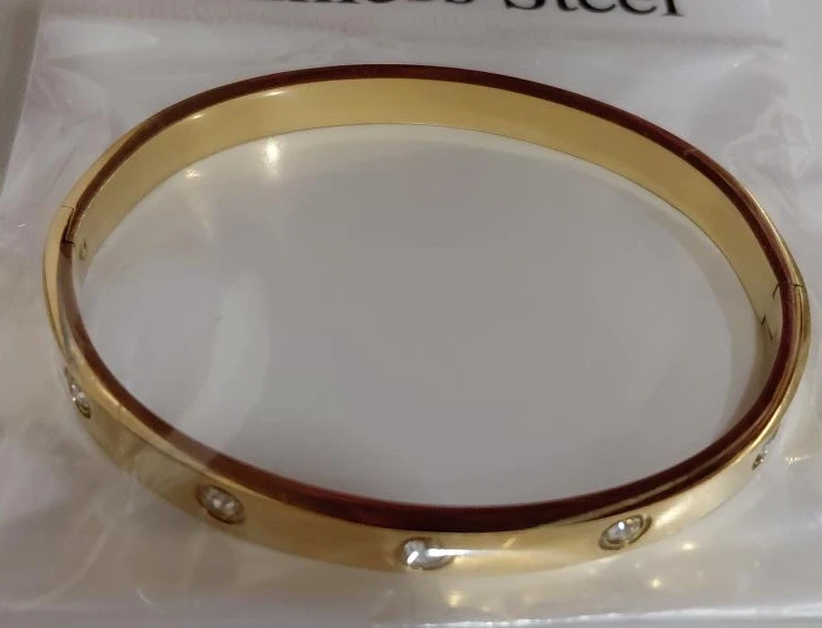 Gold Tone Stainless Steel Bangle Bracelet with Stones