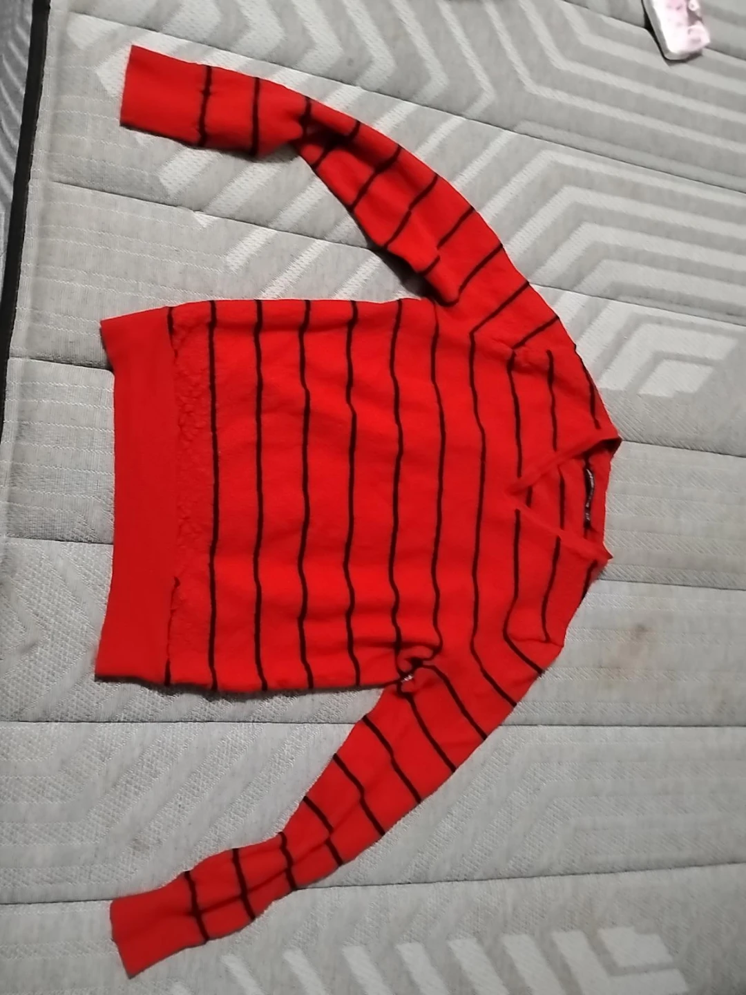 Red and black striped sweater
