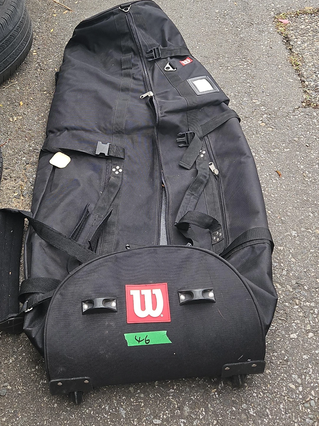 Wilson black rolling gear bag