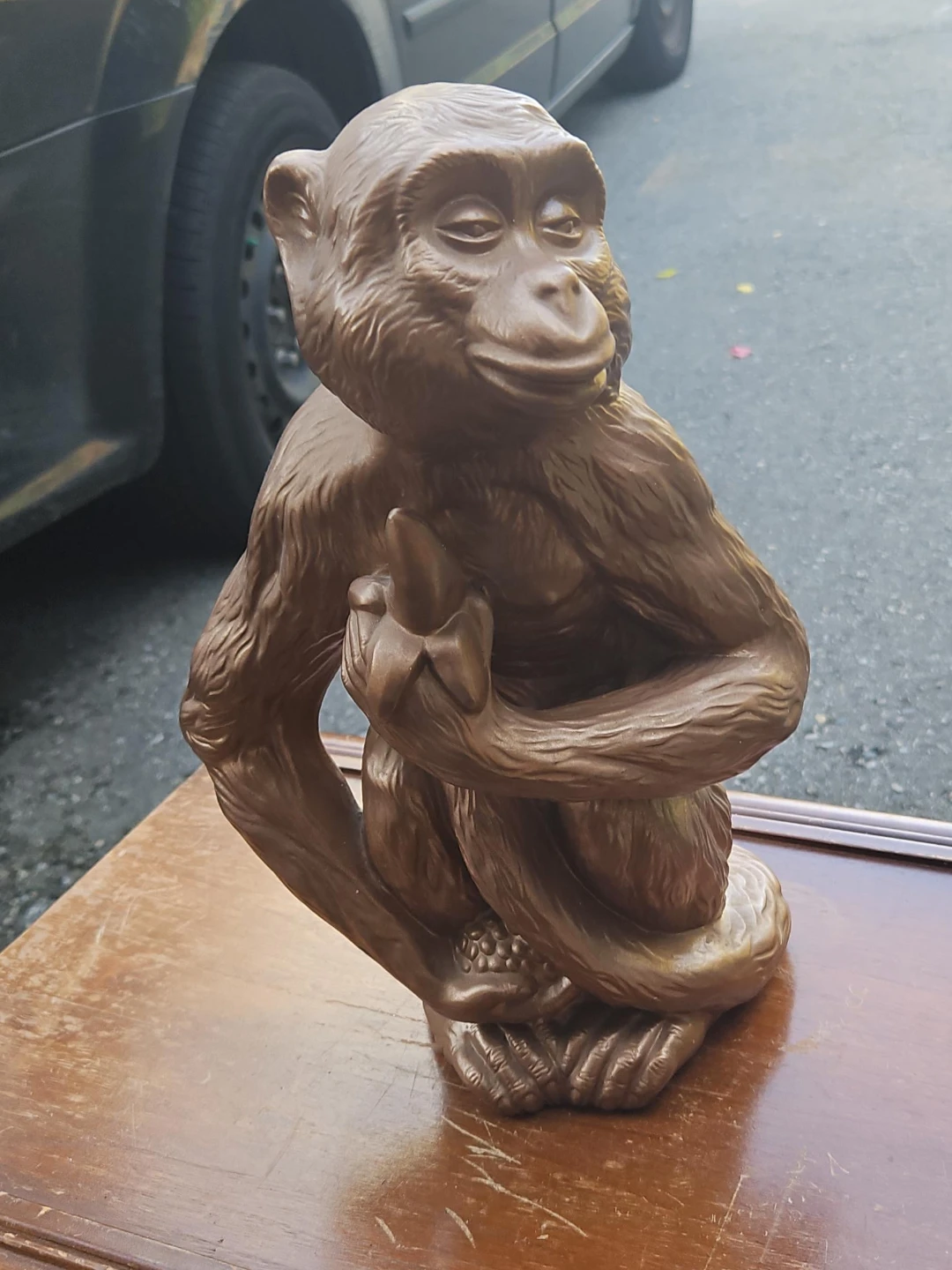 Bronze-tone monkey figurine