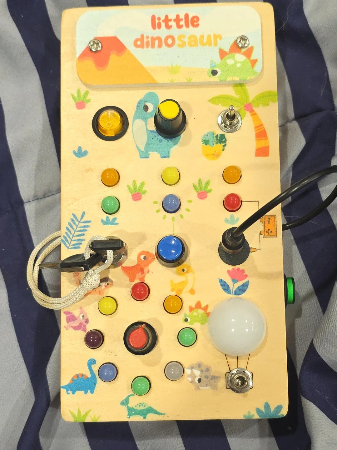 Little Dinosaur Wooden Sensory Busy Board