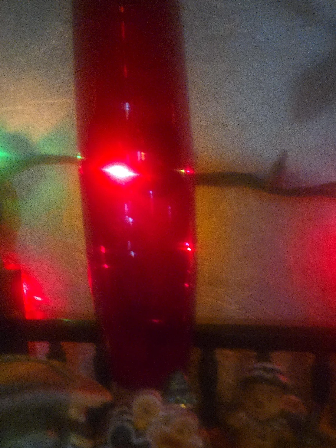 Red cylindrical glass vase
